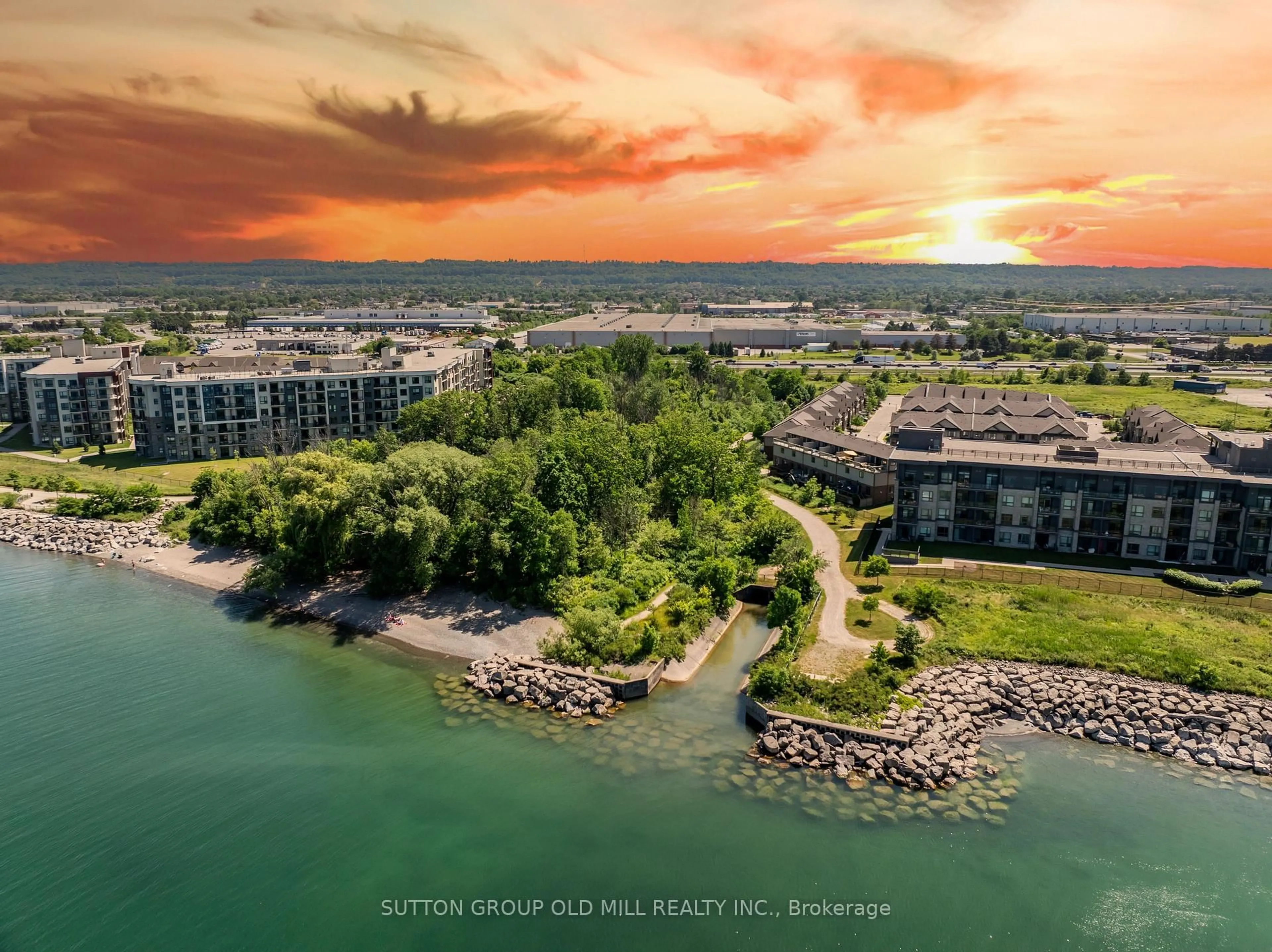 A pic from outside/outdoor area/front of a property/back of a property/a pic from drone, water/lake/river/ocean view for 53 Southshore Cres, Hamilton Ontario L8E 0J3