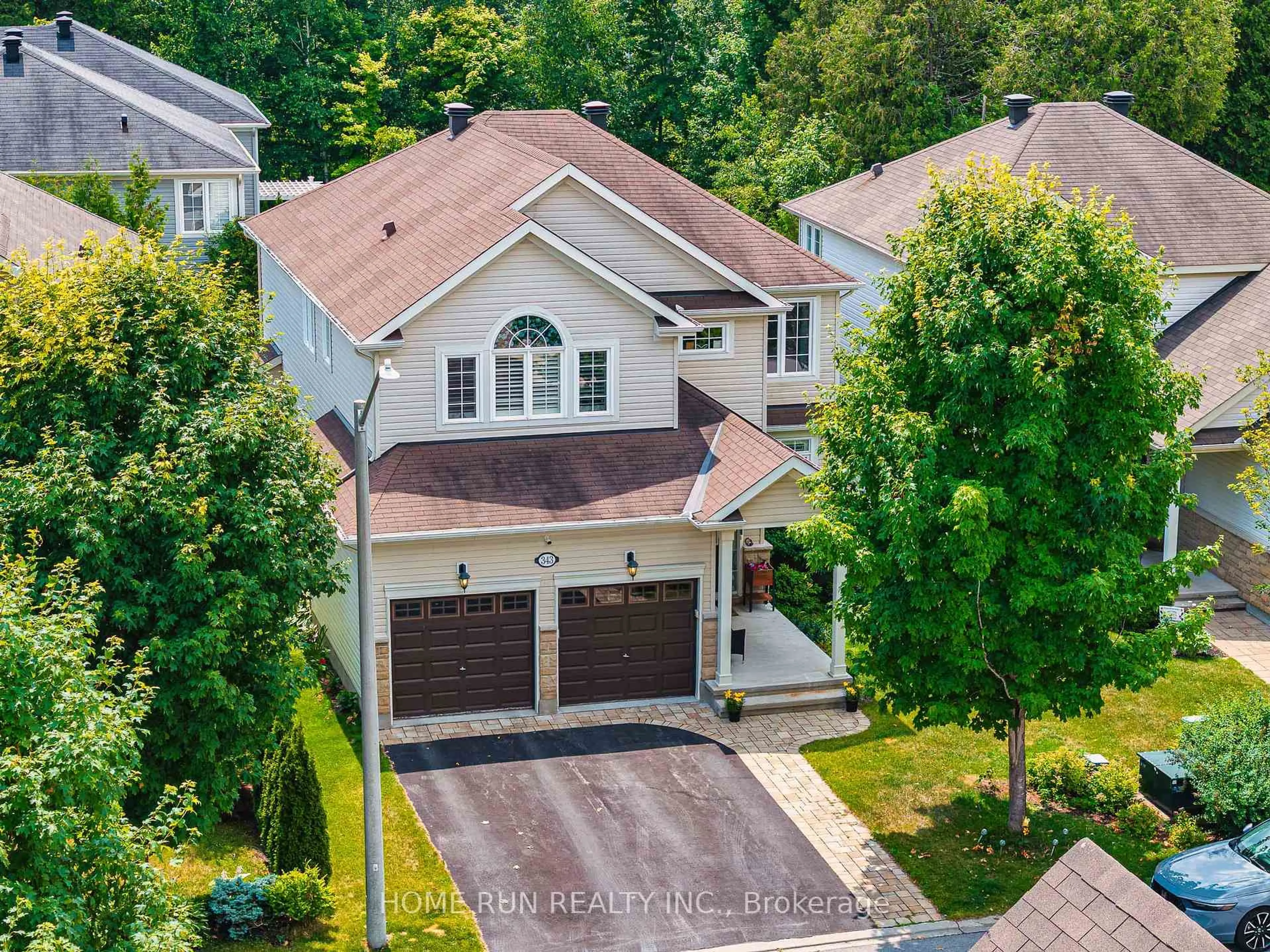 A pic from outside/outdoor area/front of a property/back of a property/a pic from drone, street for 343 Eckerson Ave, Ottawa Ontario K2S 0K9