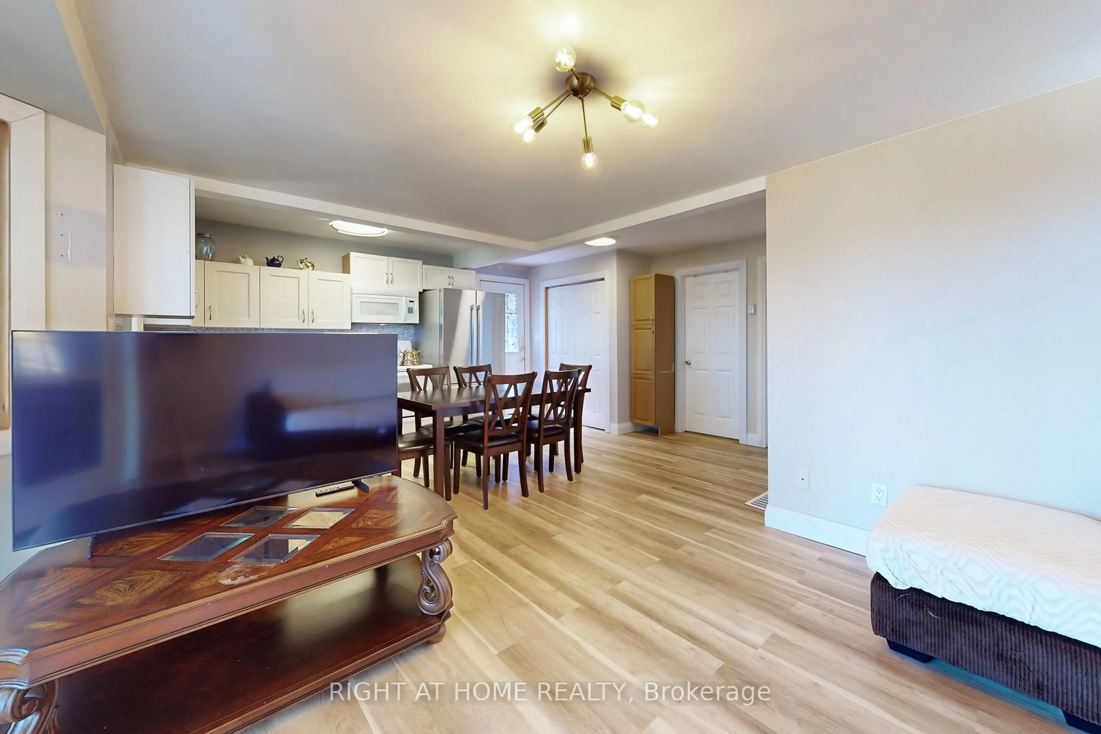 Living room with furniture, wood/laminate floor for 36 Hills Rd, Kawartha Lakes Ontario K0M 1A0