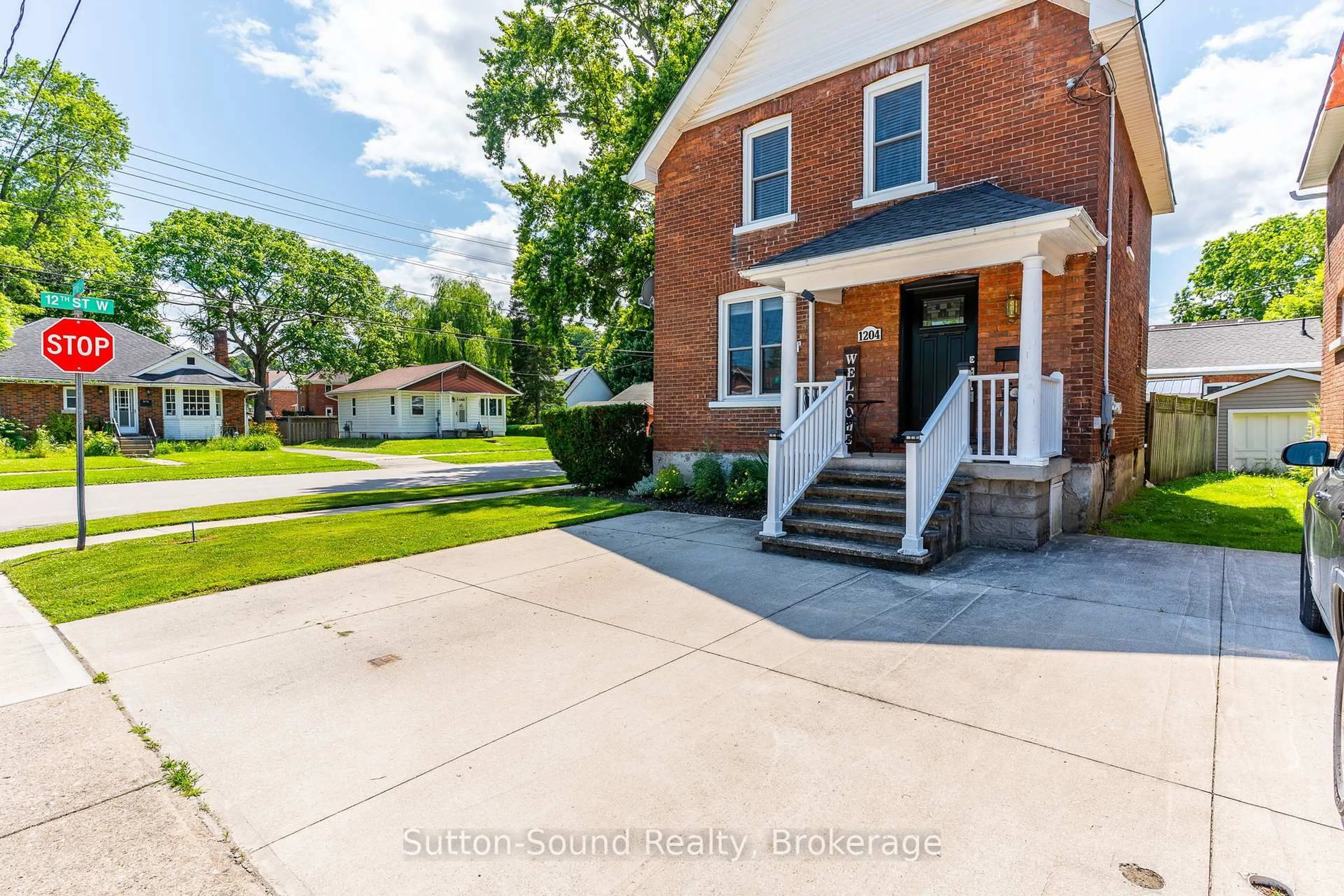 Home with brick exterior material, street for 1204 3rd A Ave, Owen Sound Ontario N4K 4T7