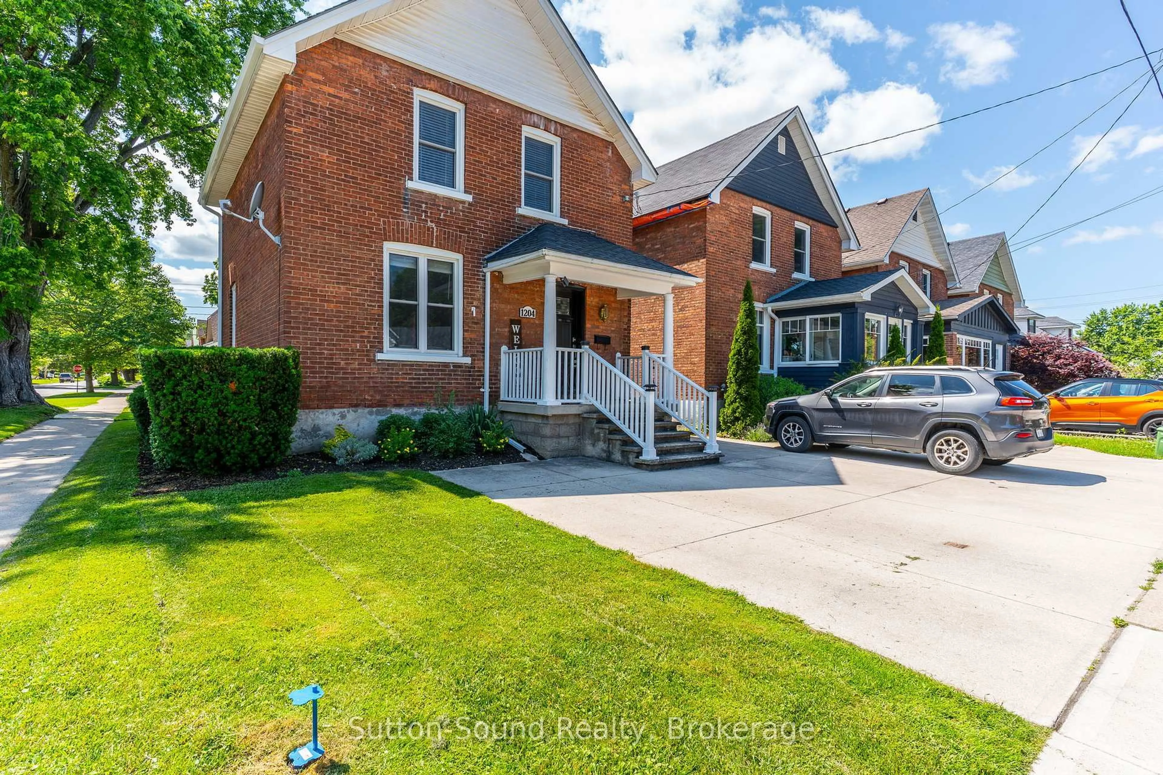 Home with brick exterior material, street for 1204 3rd A Ave, Owen Sound Ontario N4K 4T7