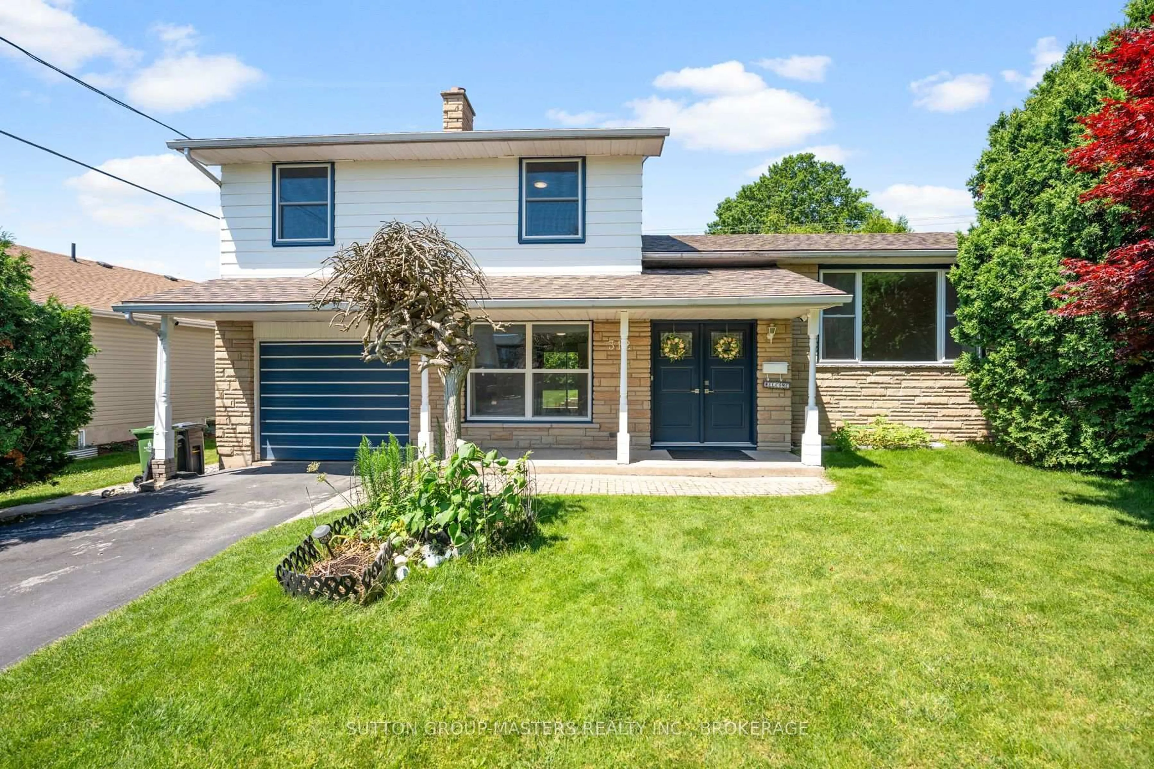Home with brick exterior material, street for 312 Boxwood St, Kingston Ontario K7M 6A6