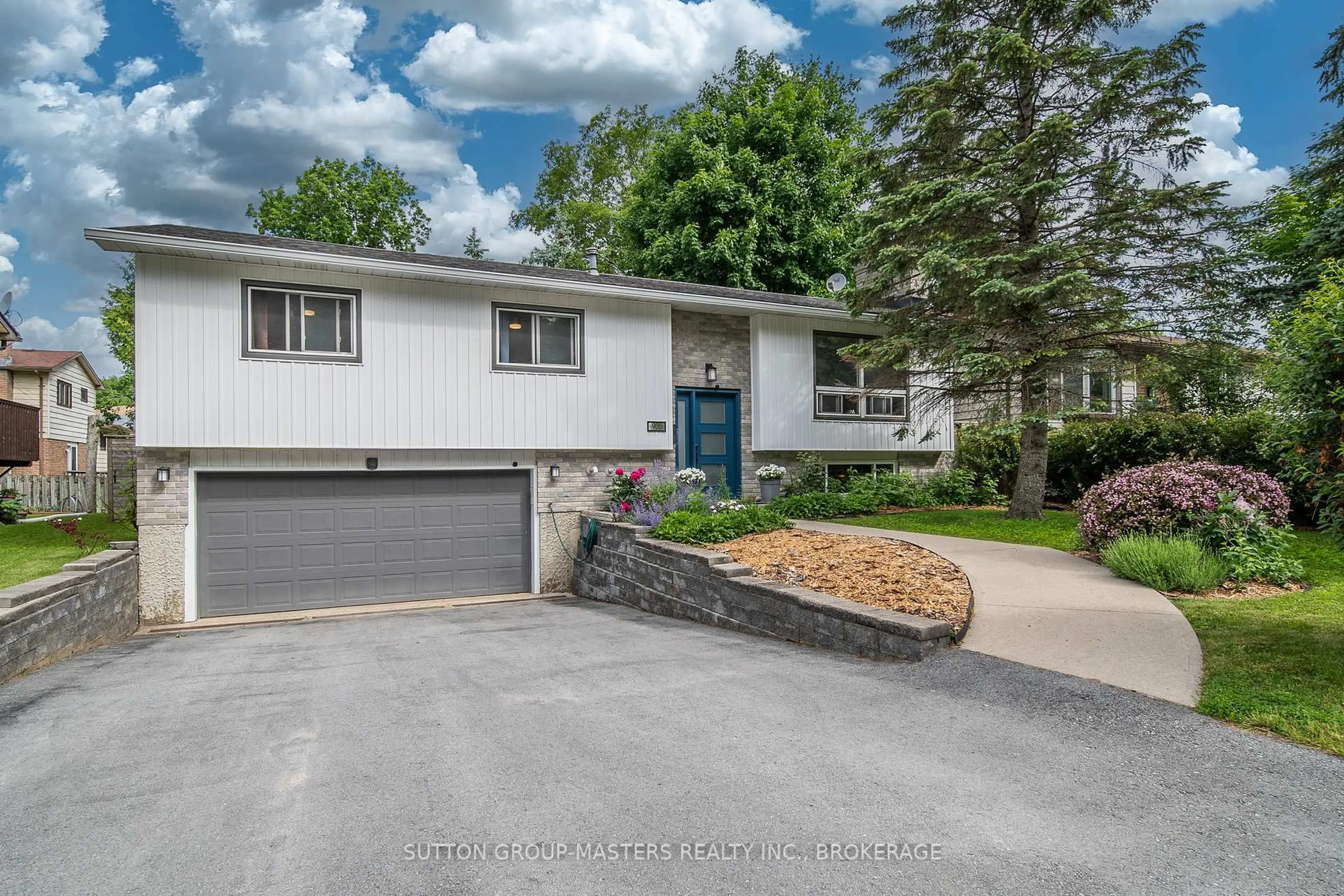 Home with vinyl exterior material, street for 905 Kenshaw Dr, Kingston Ontario K7P 1L7