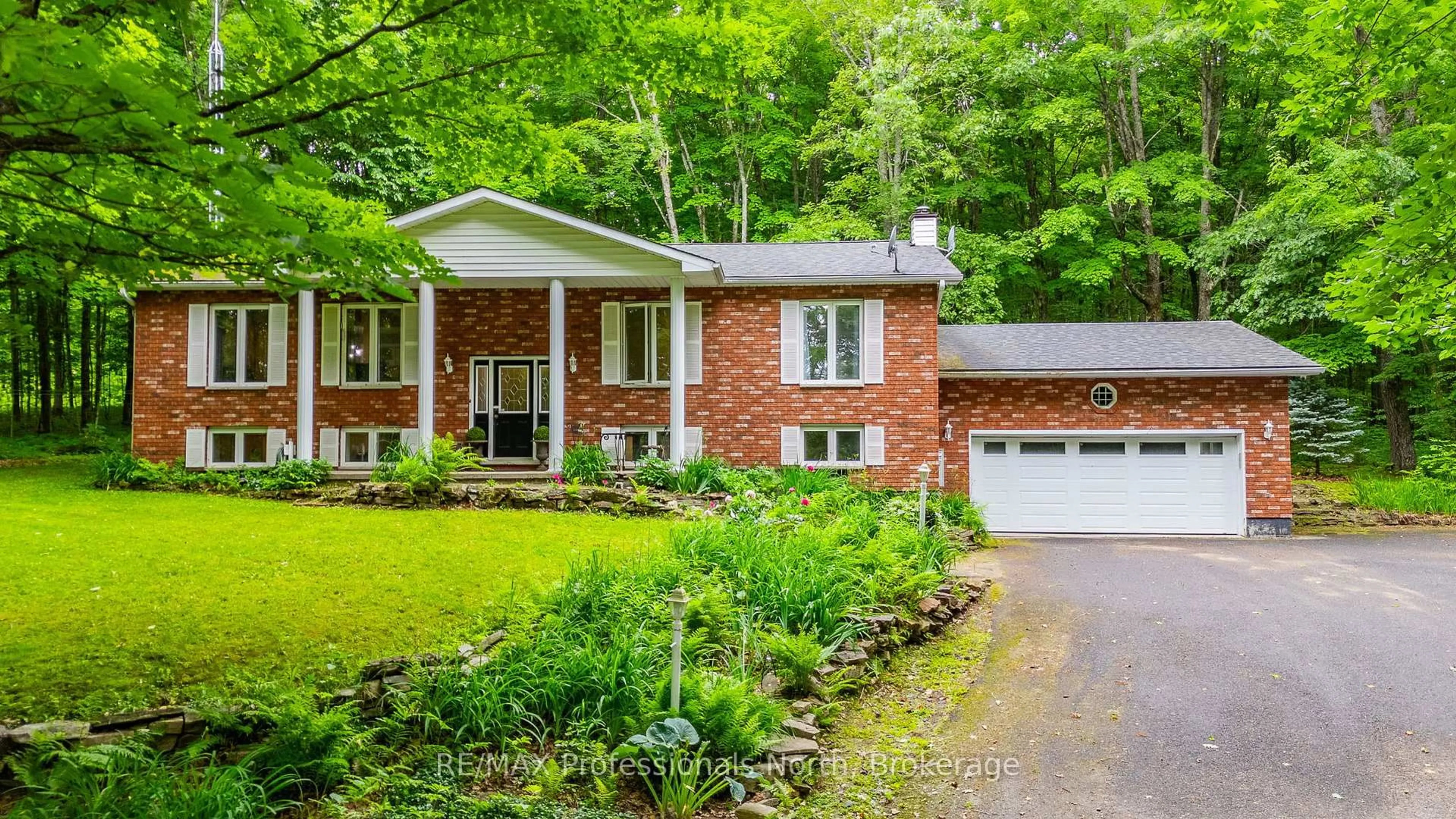 Home with brick exterior material, street for 1277 Horseshoe Lake Rd, Minden Hills Ontario K0M 2K0