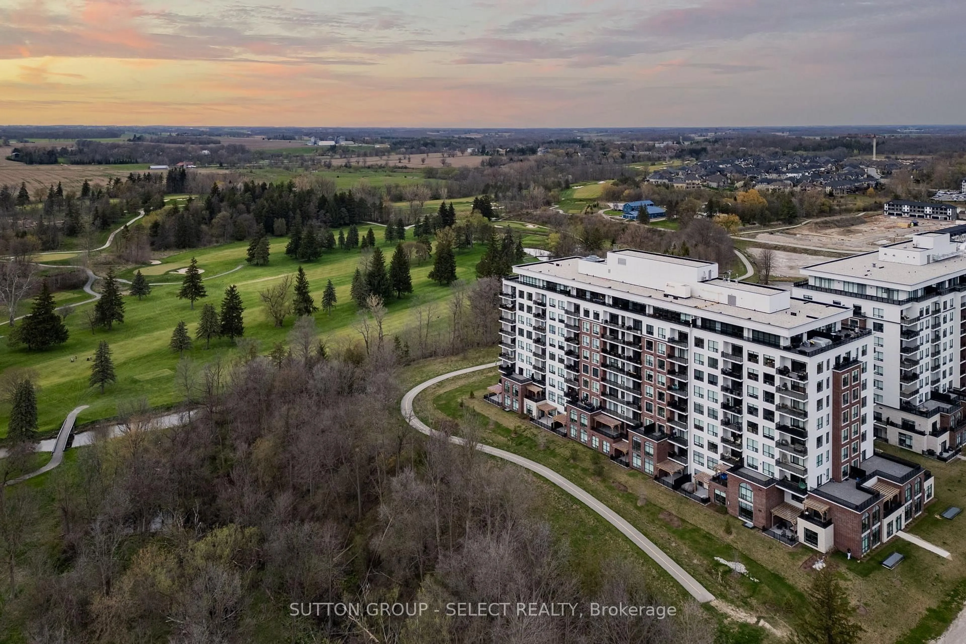 A pic from outside/outdoor area/front of a property/back of a property/a pic from drone, unknown for 460 Callaway Rd #1001, London North Ontario N6G 0Z2