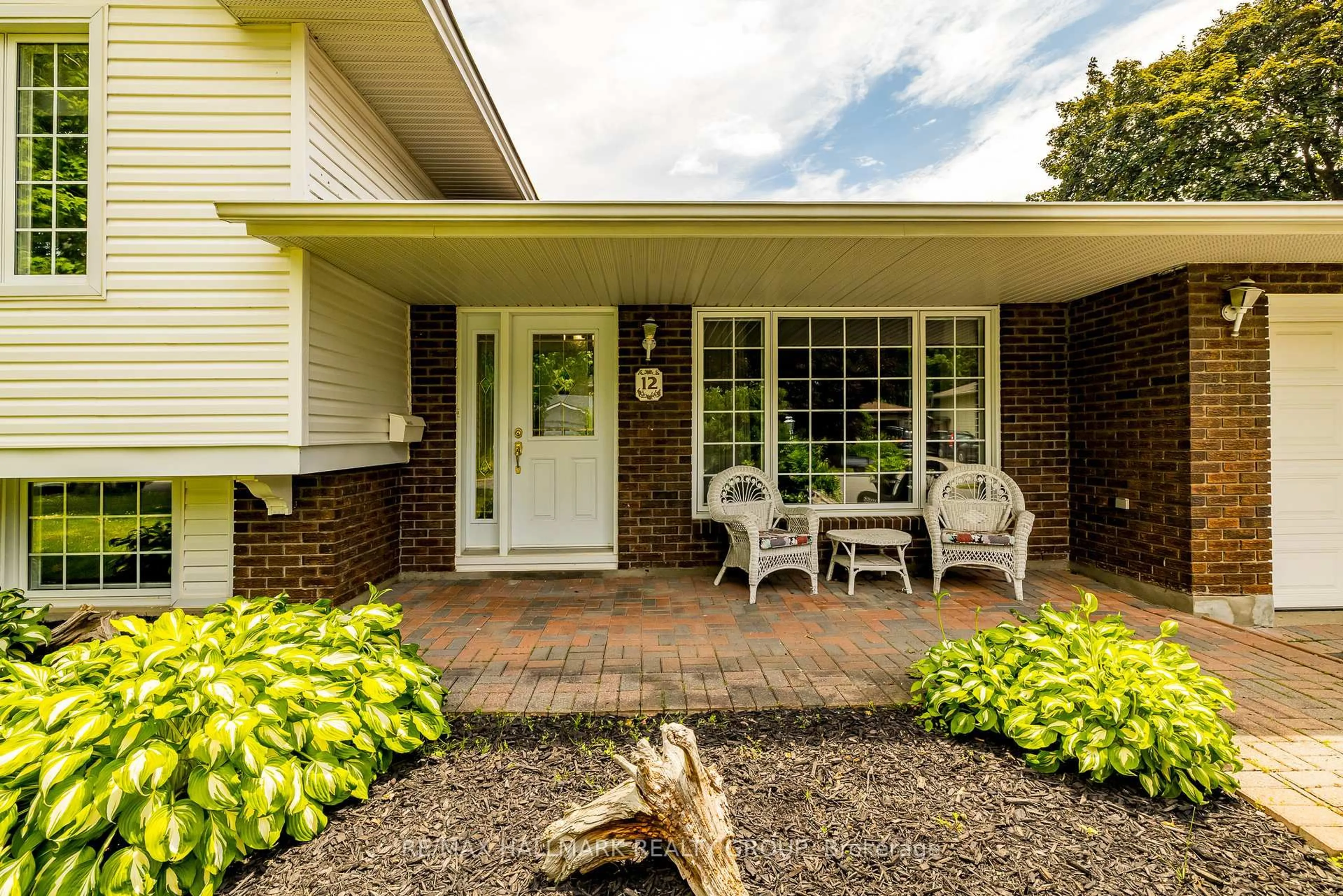 Home with brick exterior material, street for 12 Ancona Cres, Ottawa Ontario K2G 0N8