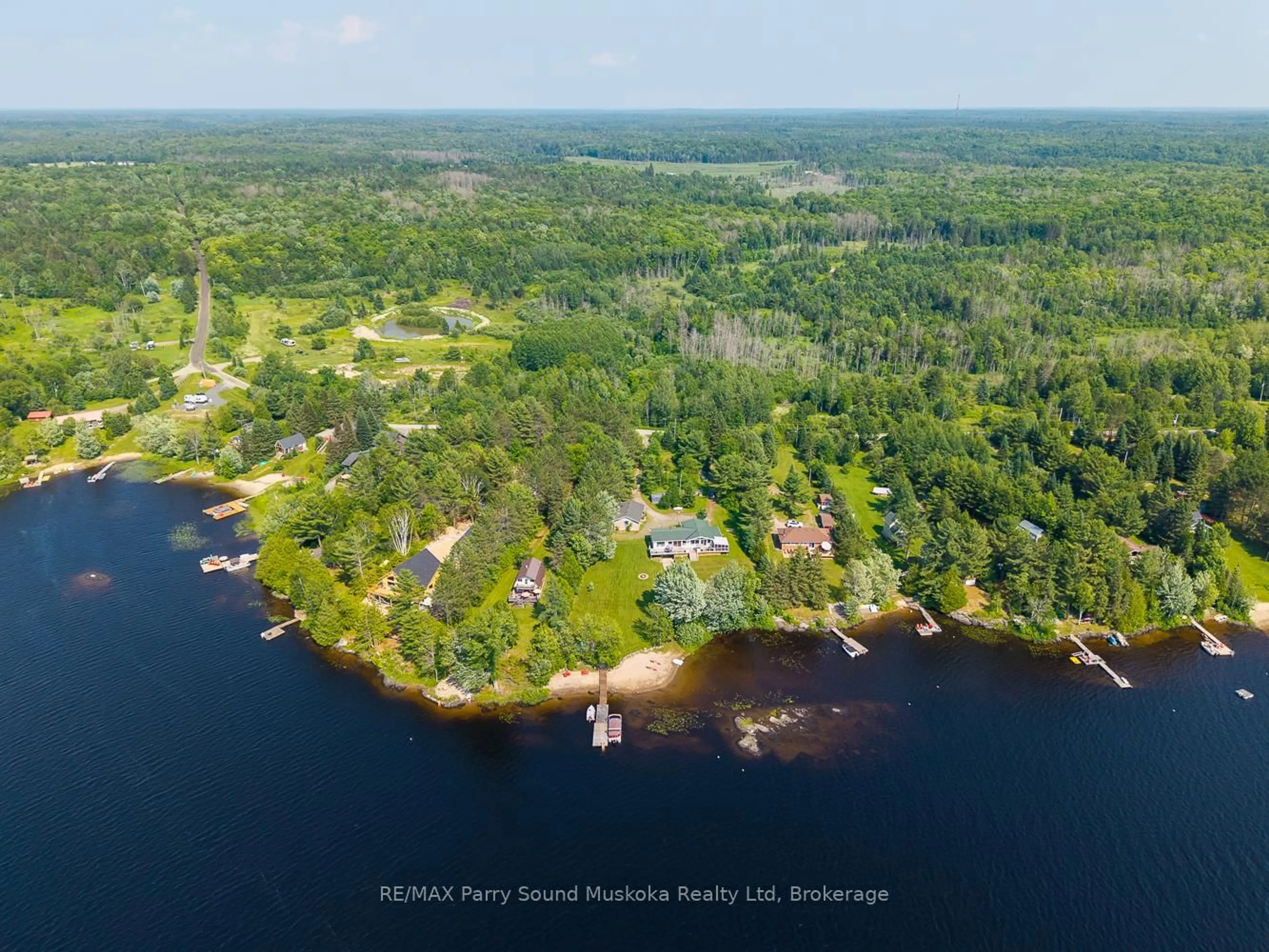A pic from outside/outdoor area/front of a property/back of a property/a pic from drone, water/lake/river/ocean view for 97 Gibson Bay Rd, Whitestone Ontario P0A 1G0