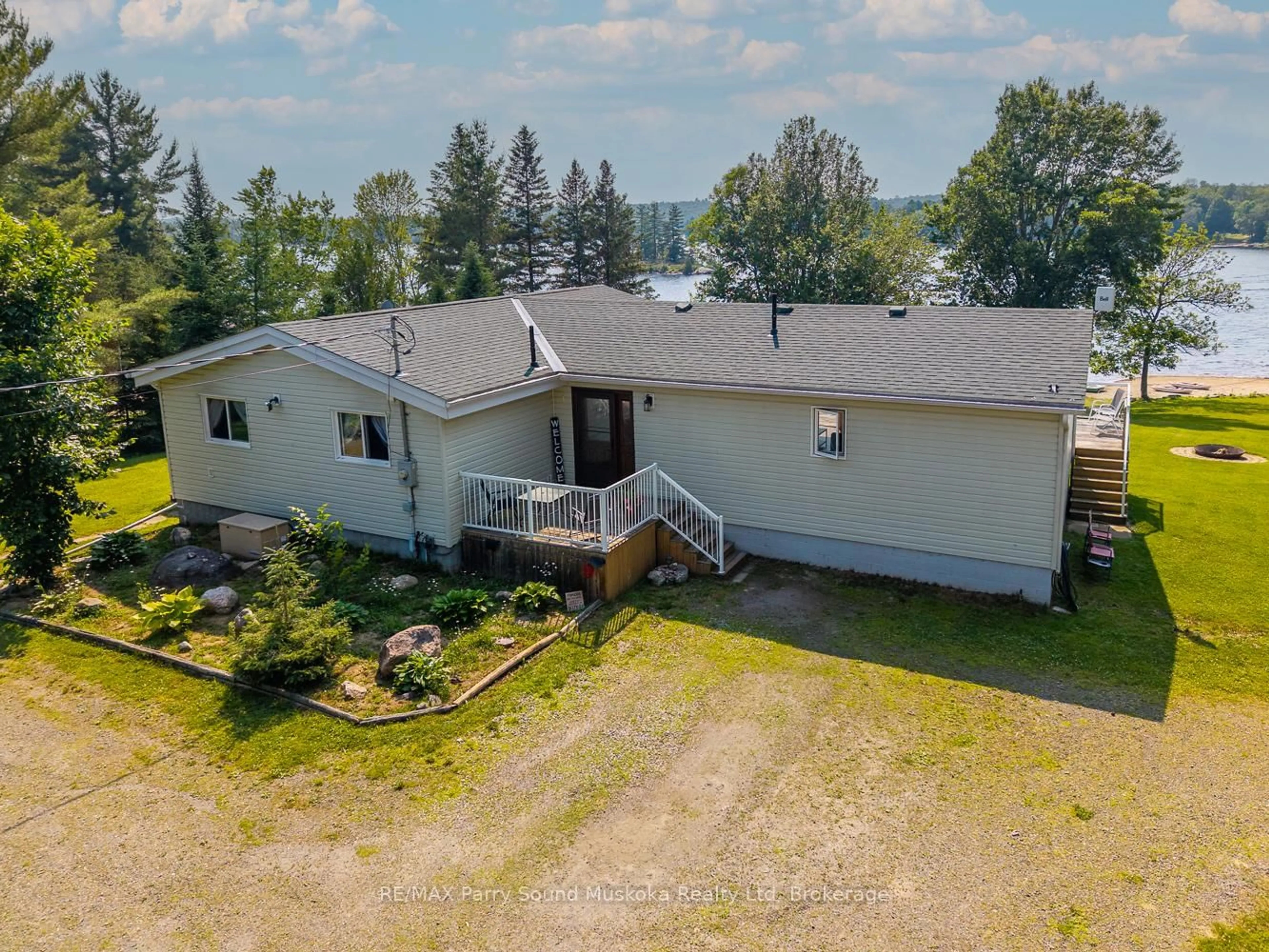 A pic from outside/outdoor area/front of a property/back of a property/a pic from drone, water/lake/river/ocean view for 97 Gibson Bay Rd, Whitestone Ontario P0A 1G0