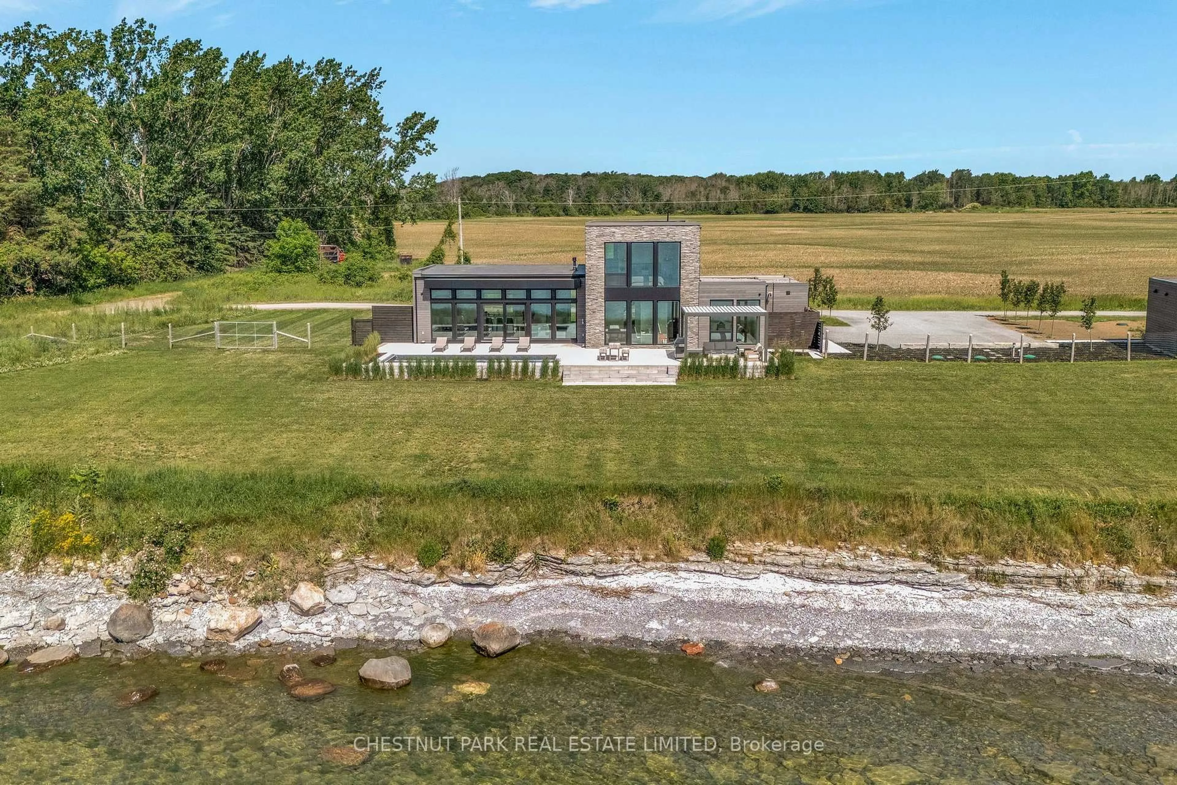 A pic from outside/outdoor area/front of a property/back of a property/a pic from drone, water/lake/river/ocean view for 34 Jarvis Lane, Prince Edward County Ontario K0K 2T0