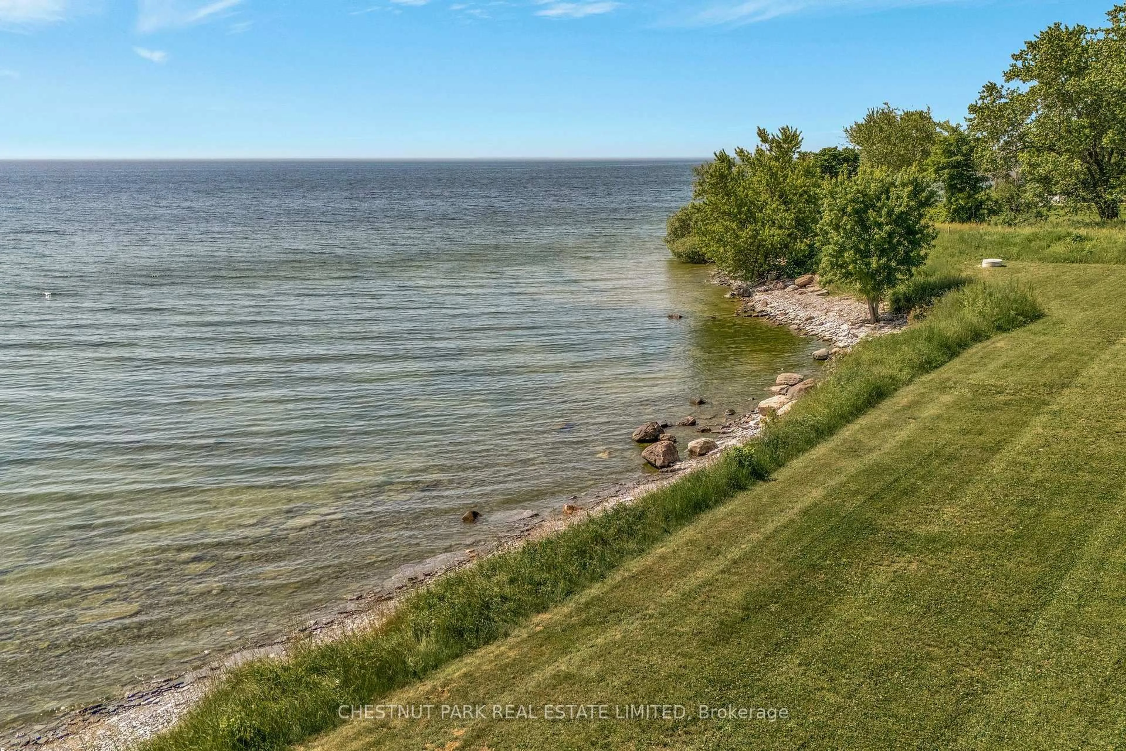 A pic from outside/outdoor area/front of a property/back of a property/a pic from drone, water/lake/river/ocean view for 34 Jarvis Lane, Prince Edward County Ontario K0K 2T0