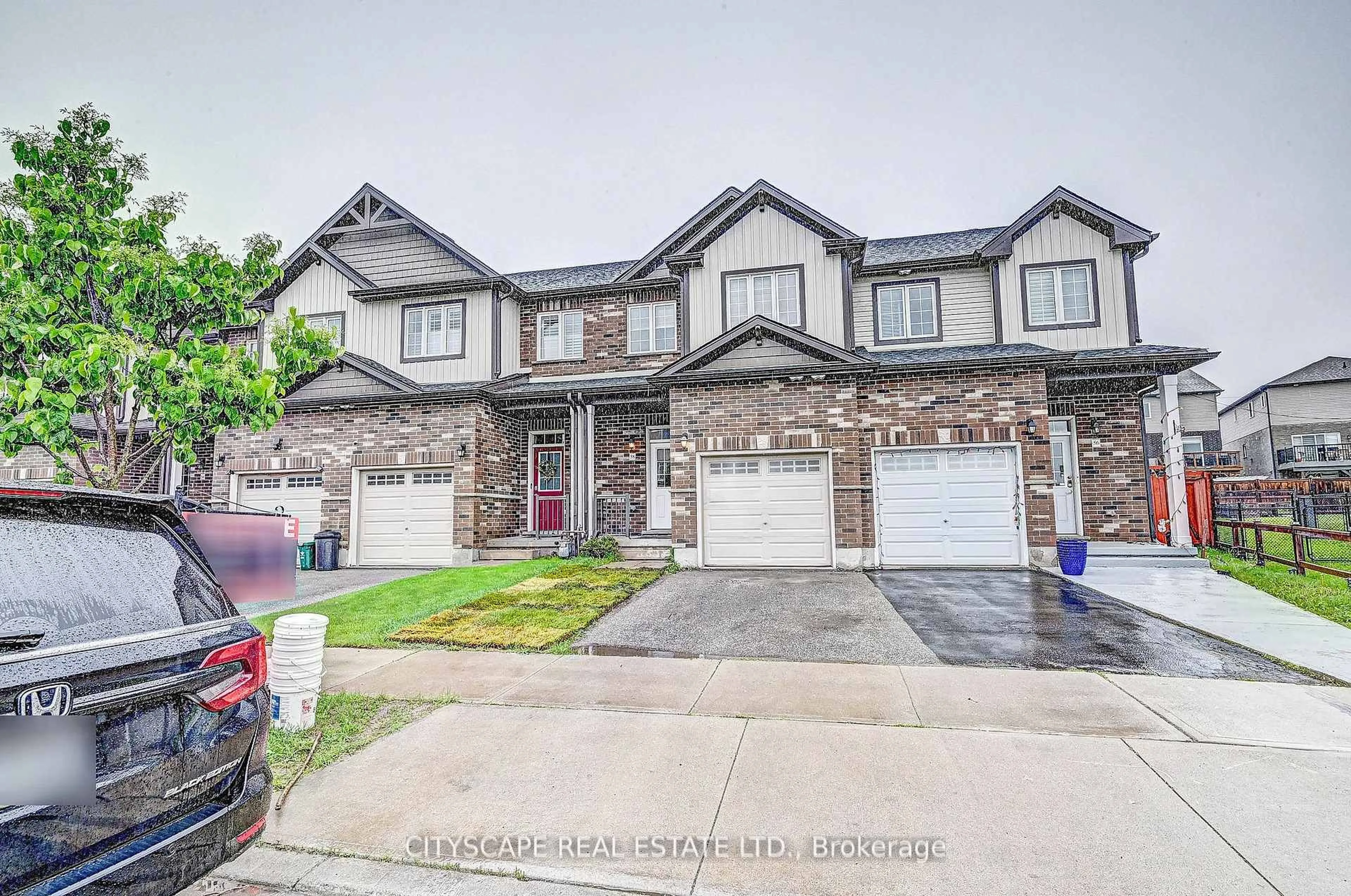 Home with brick exterior material, street for 58 Renfrew St, Kitchener Ontario N2R 0G5
