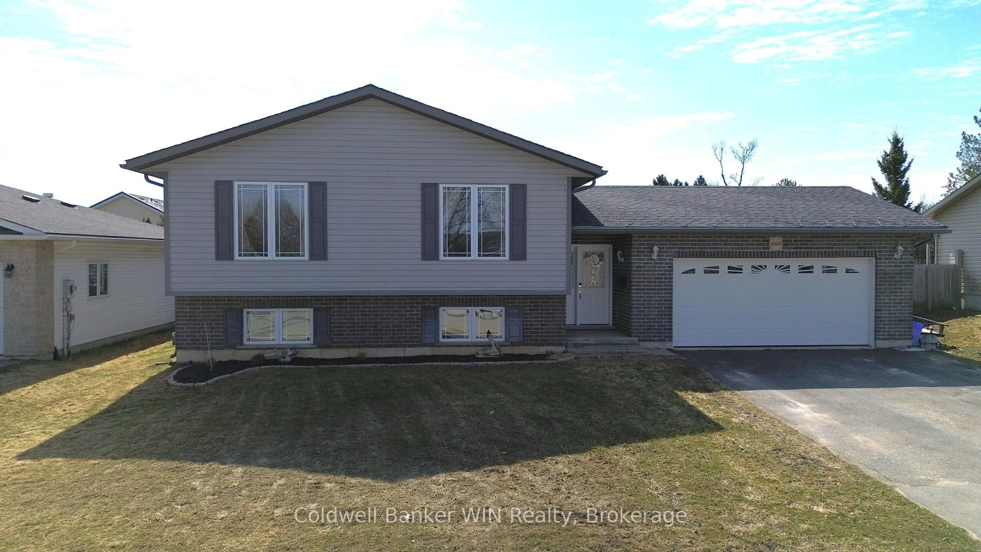 Home with vinyl exterior material, street for 460 King St, Wellington North Ontario N0G 2L2