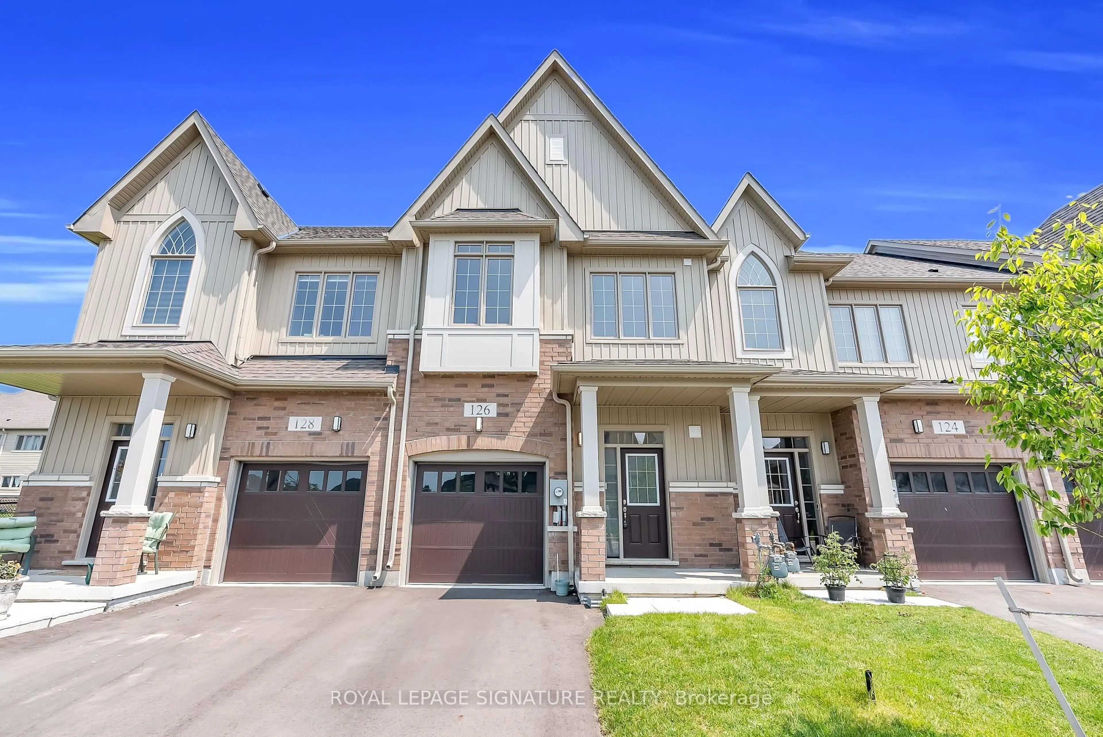 Home with brick exterior material, street for 126 Waters Way, Wellington North Ontario N0G 1A0