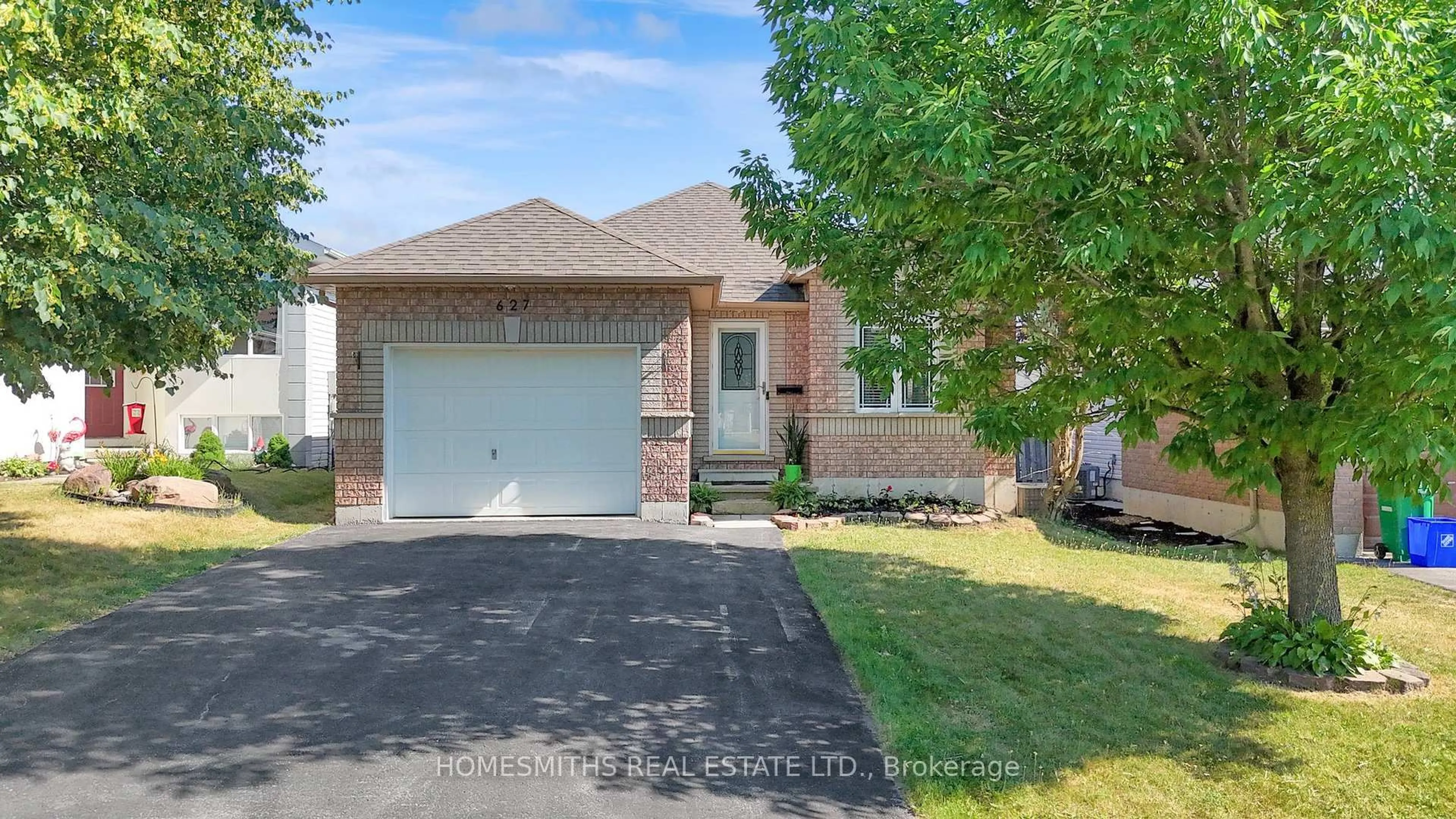 Home with brick exterior material, street for 627 Trailview Dr, Peterborough South Ontario K9J 8P3