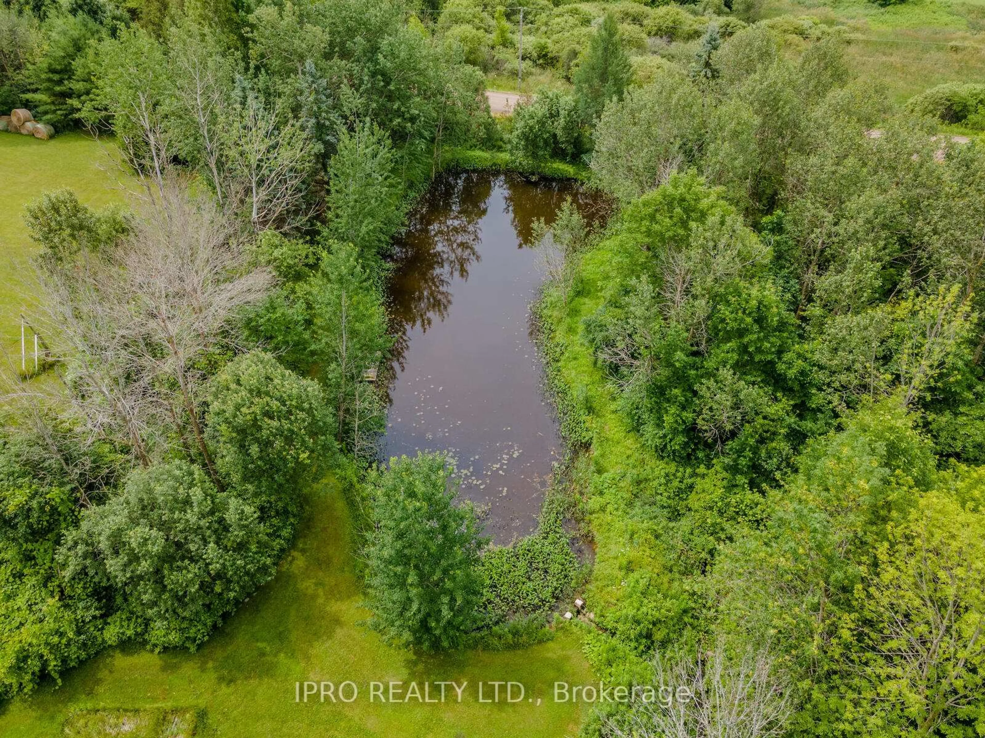 A pic from outside/outdoor area/front of a property/back of a property/a pic from drone, water/lake/river/ocean view for 9206 Sideroad 17 Rd, Erin Ontario N0B 1Z0