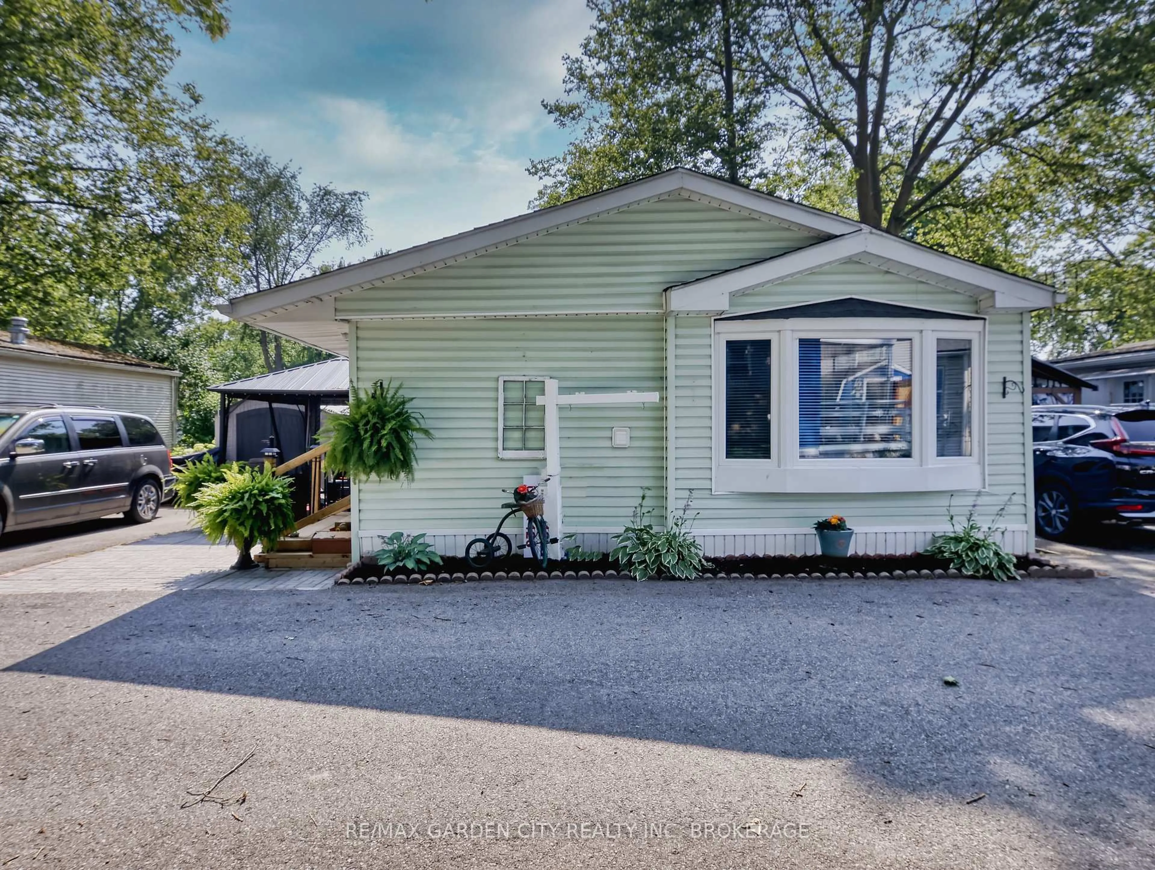 Home with vinyl exterior material, street for 23 Four Mile Creek Rd #426, Niagara-on-the-Lake Ontario L0S 1J1