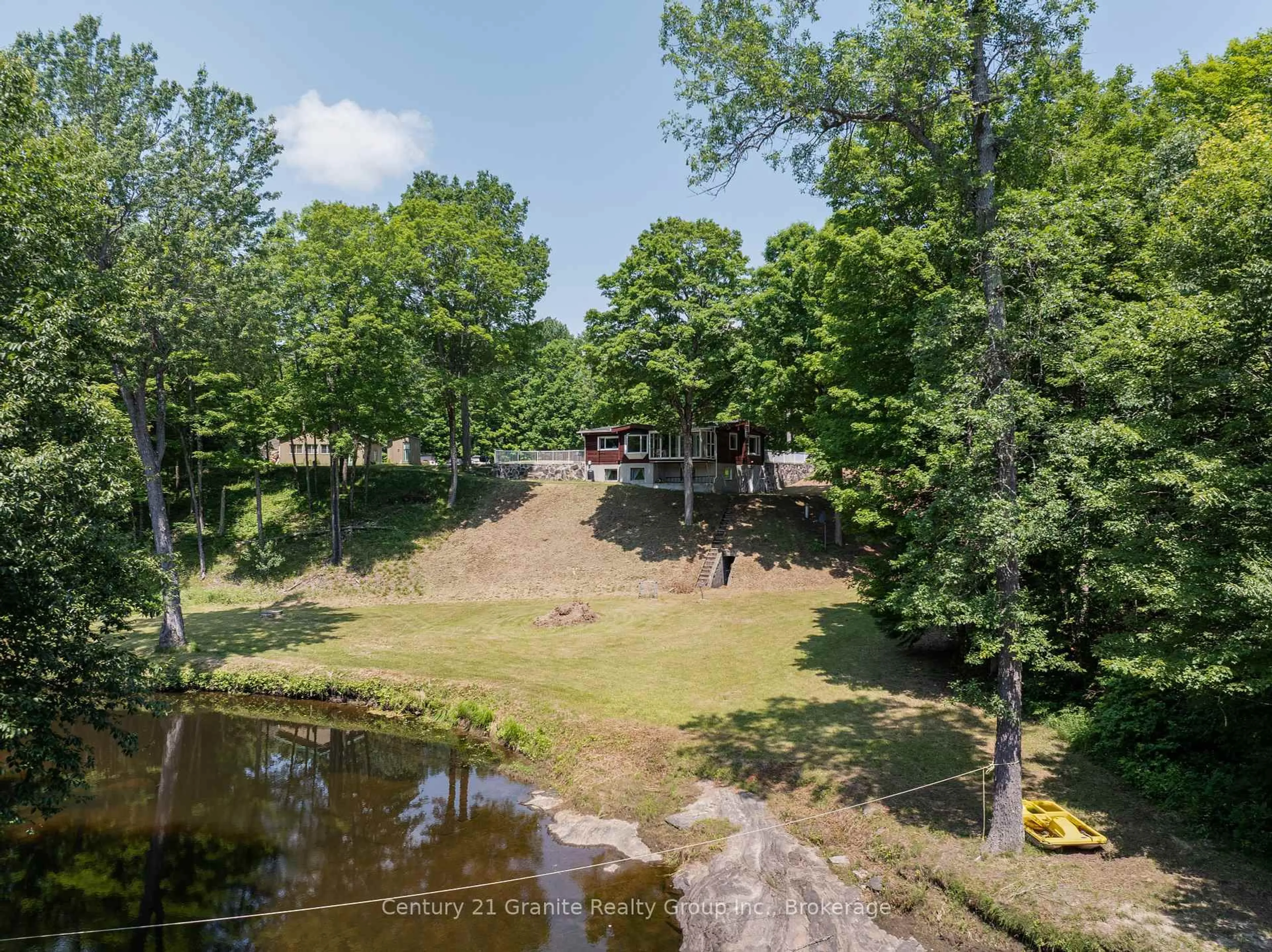 A pic from outside/outdoor area/front of a property/back of a property/a pic from drone, water/lake/river/ocean view for 329 Rose Island Rd, North Kawartha Ontario K0L 1A0