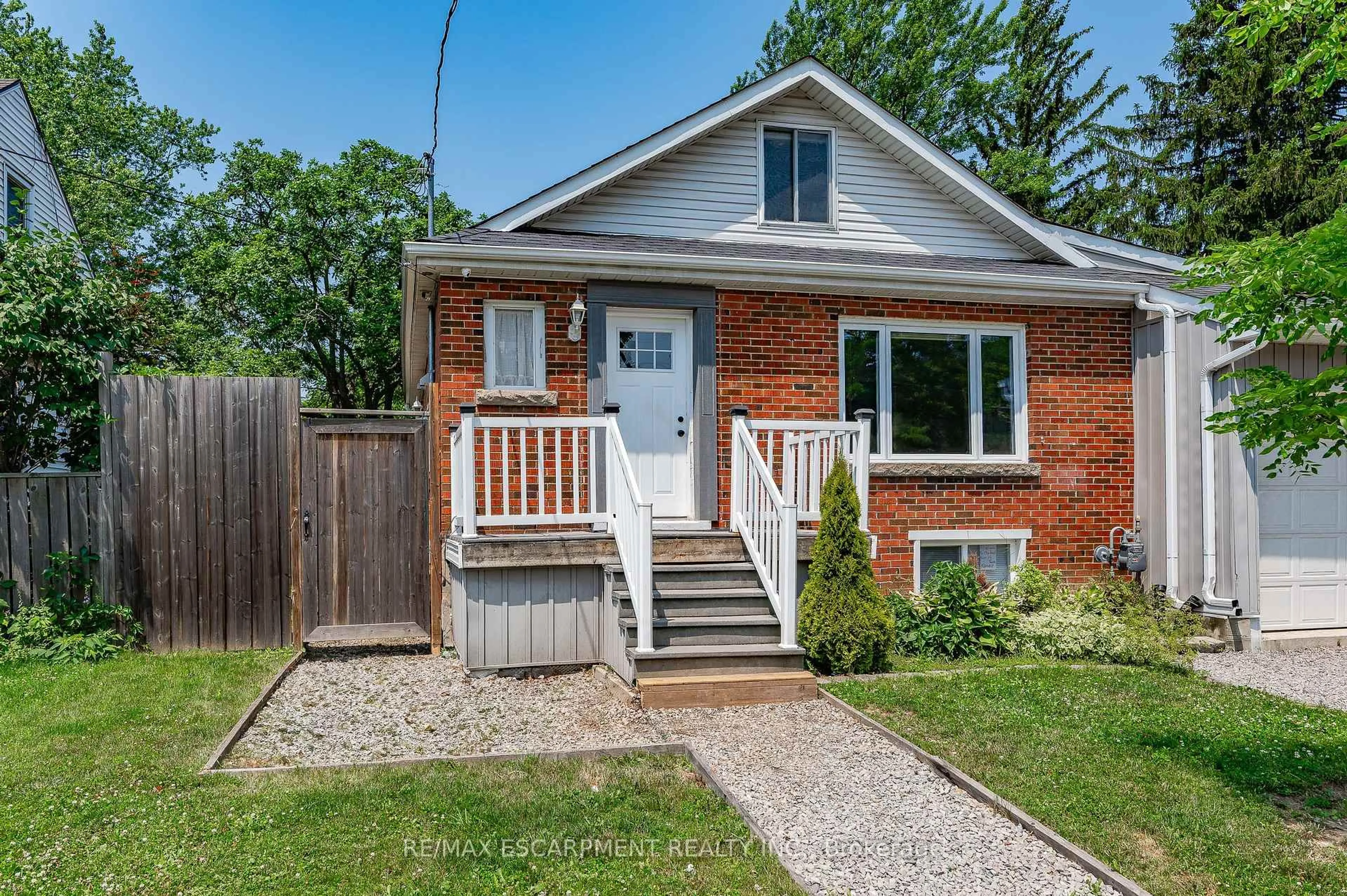 Home with brick exterior material, street for 78 West 3rd St, Hamilton Ontario L9C 3K3