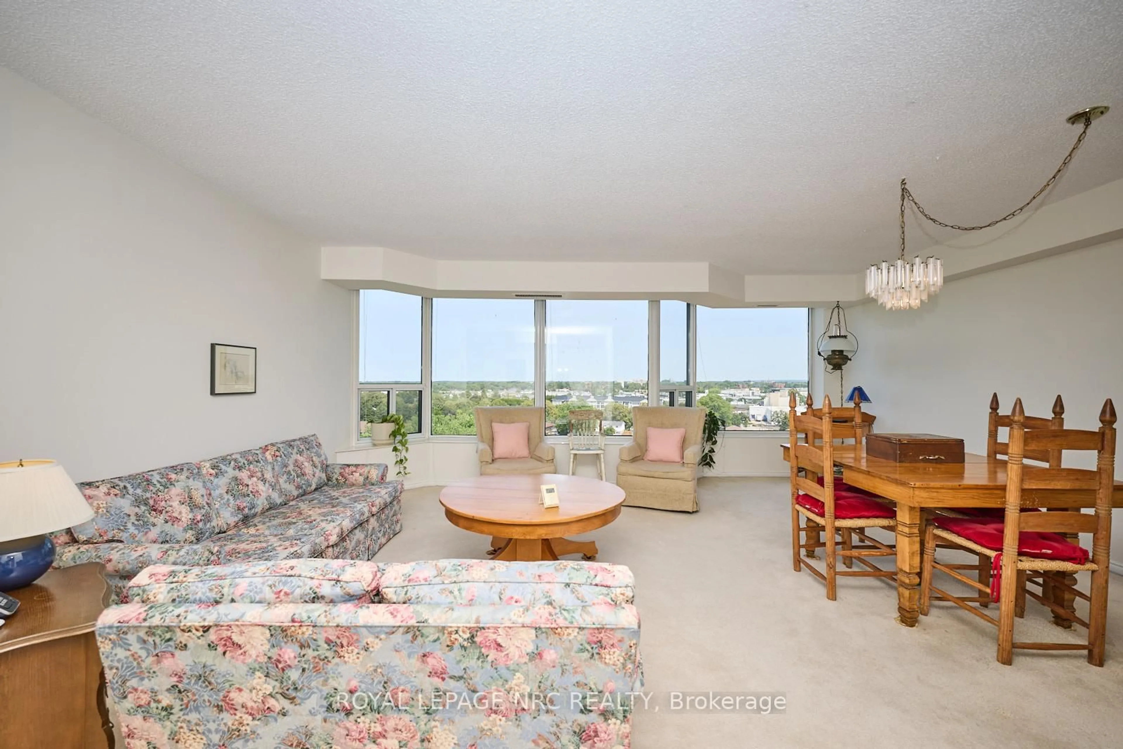 Living room with furniture, unknown for 81 Scott St #1011, St. Catharines Ontario L2N 7L5