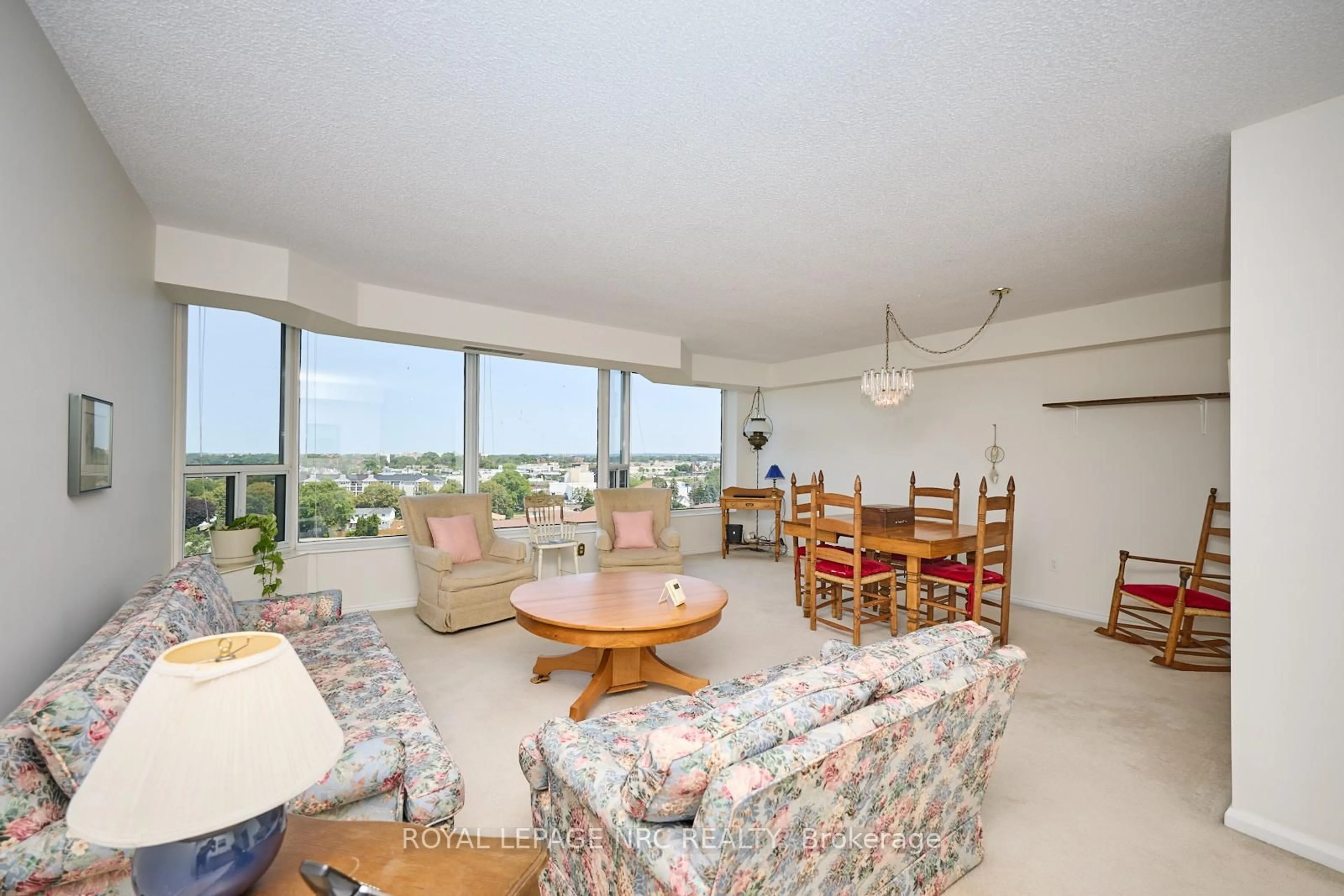 Living room with furniture, unknown for 81 Scott St #1011, St. Catharines Ontario L2N 7L5