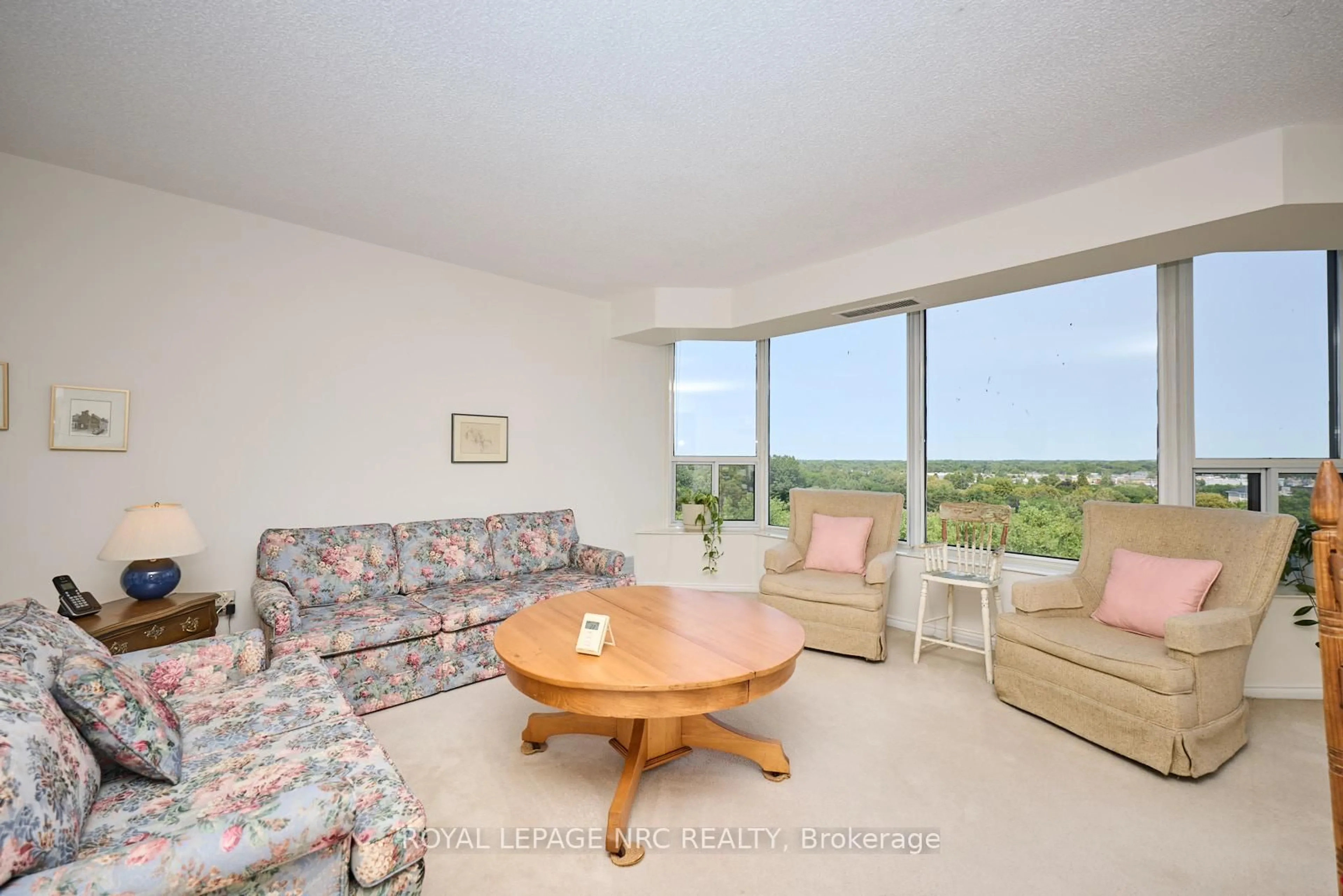 Living room with furniture, unknown for 81 Scott St #1011, St. Catharines Ontario L2N 7L5