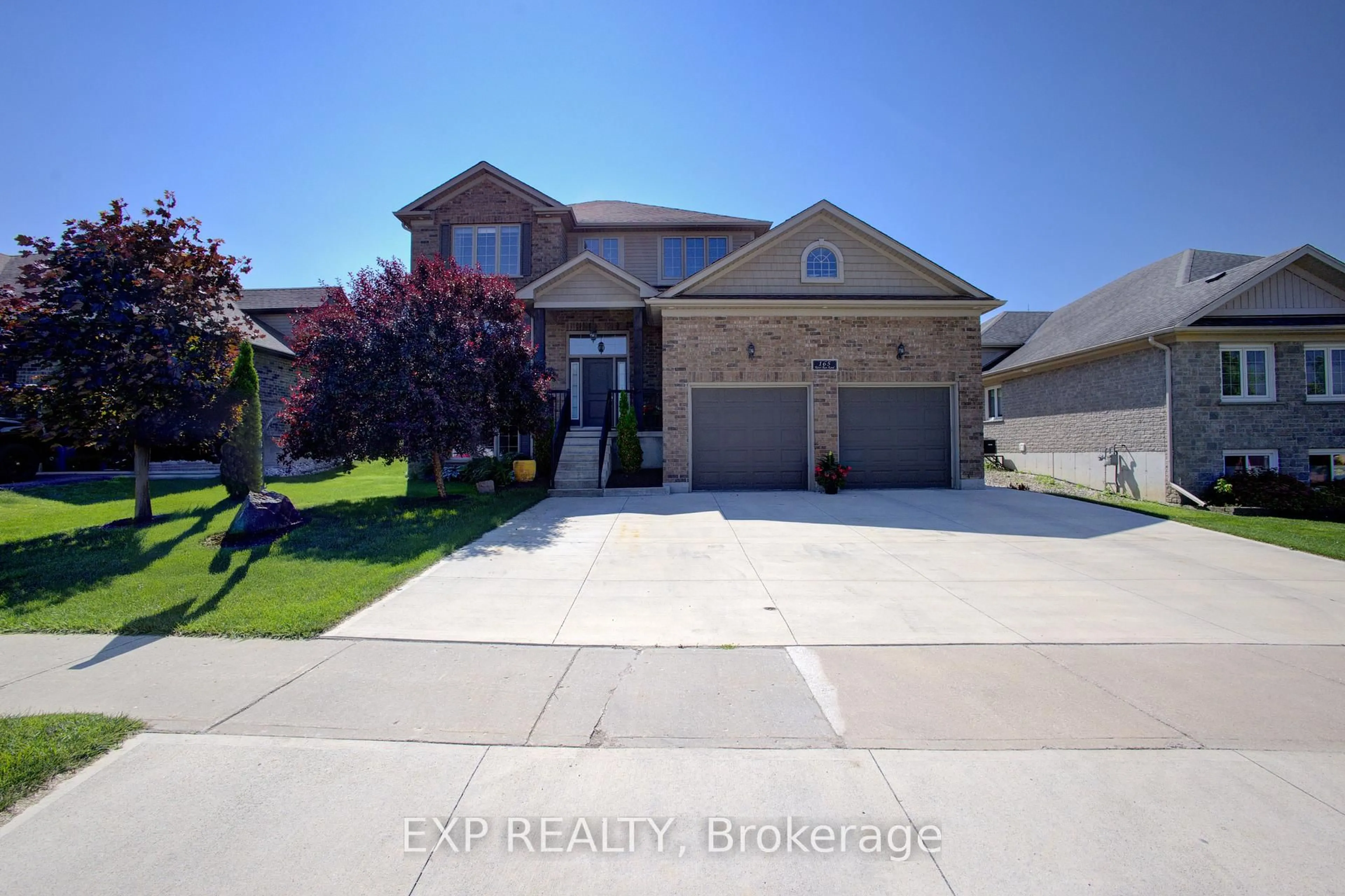 A pic from outside/outdoor area/front of a property/back of a property/a pic from drone, street for 165 River Run Rd, Mapleton Ontario N0G 1P0