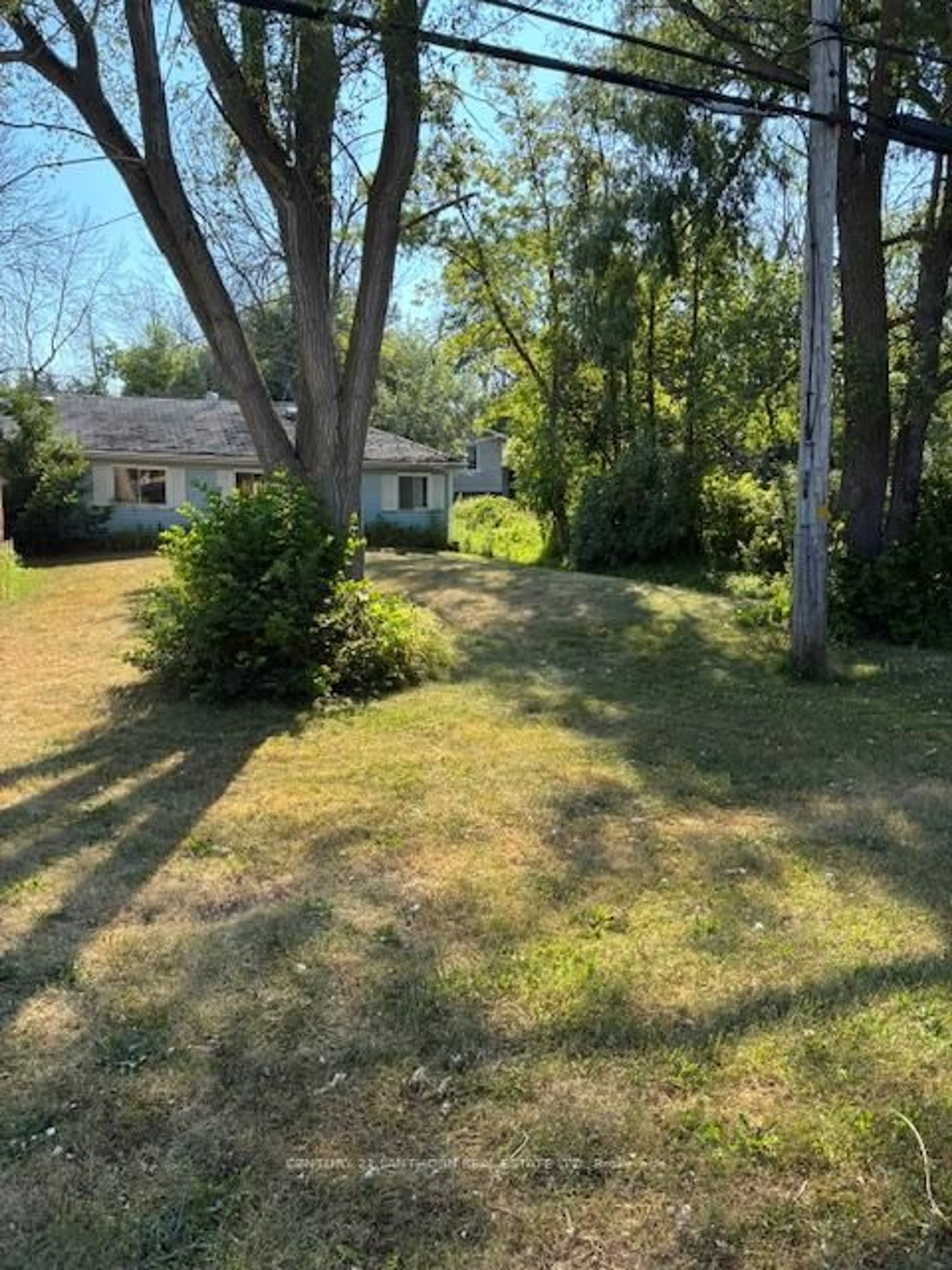 A pic from outside/outdoor area/front of a property/back of a property/a pic from drone, street for 741 County Road 28 Rd, Prince Edward County Ontario K8N 4Z7