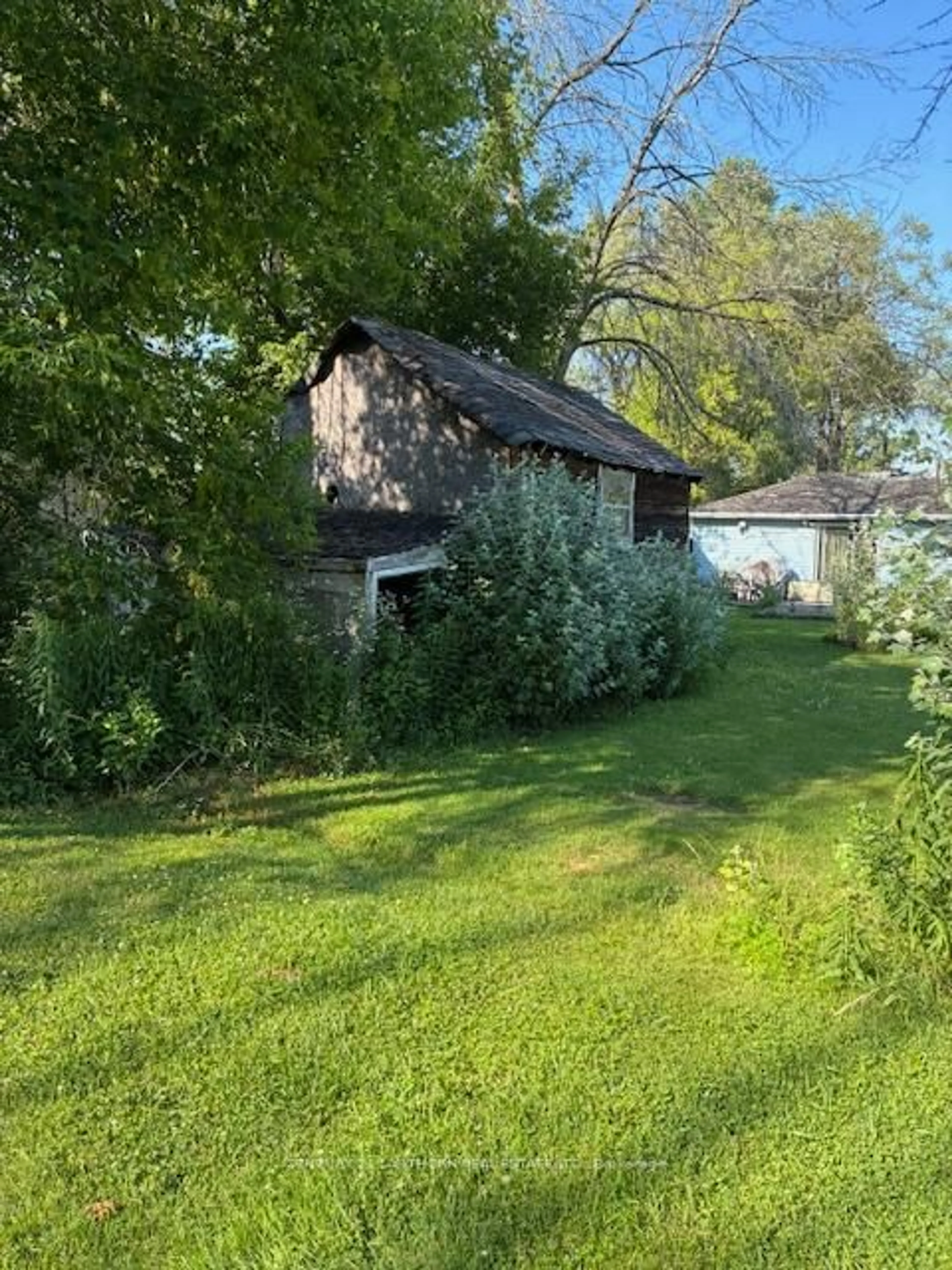 A pic from outside/outdoor area/front of a property/back of a property/a pic from drone, unknown for 741 County Road 28 Rd, Prince Edward County Ontario K8N 4Z7