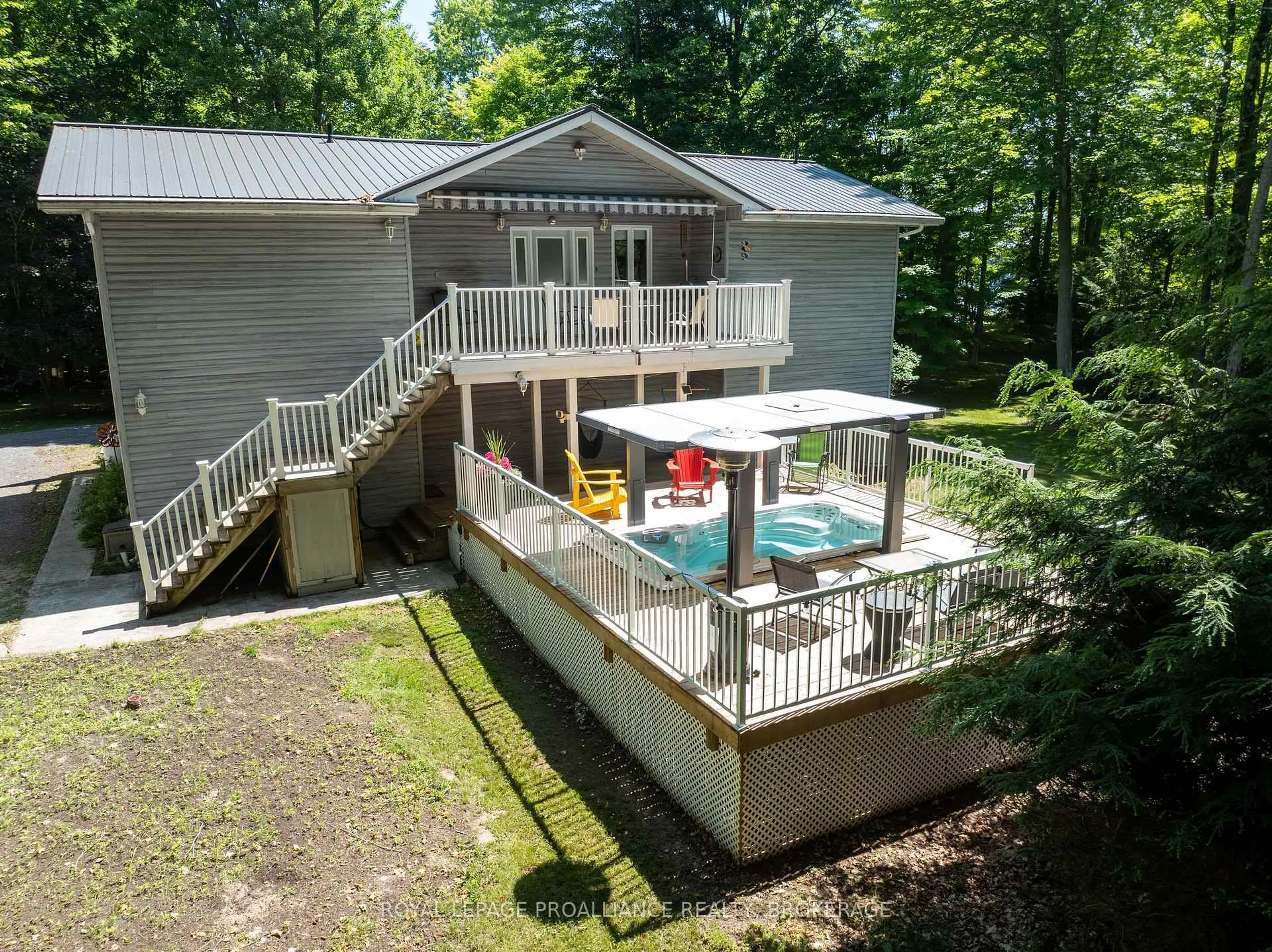 A pic from outside/outdoor area/front of a property/back of a property/a pic from drone, unknown for 111 Sugarhouse Lane, Rideau Lakes Ontario K0G 1X0