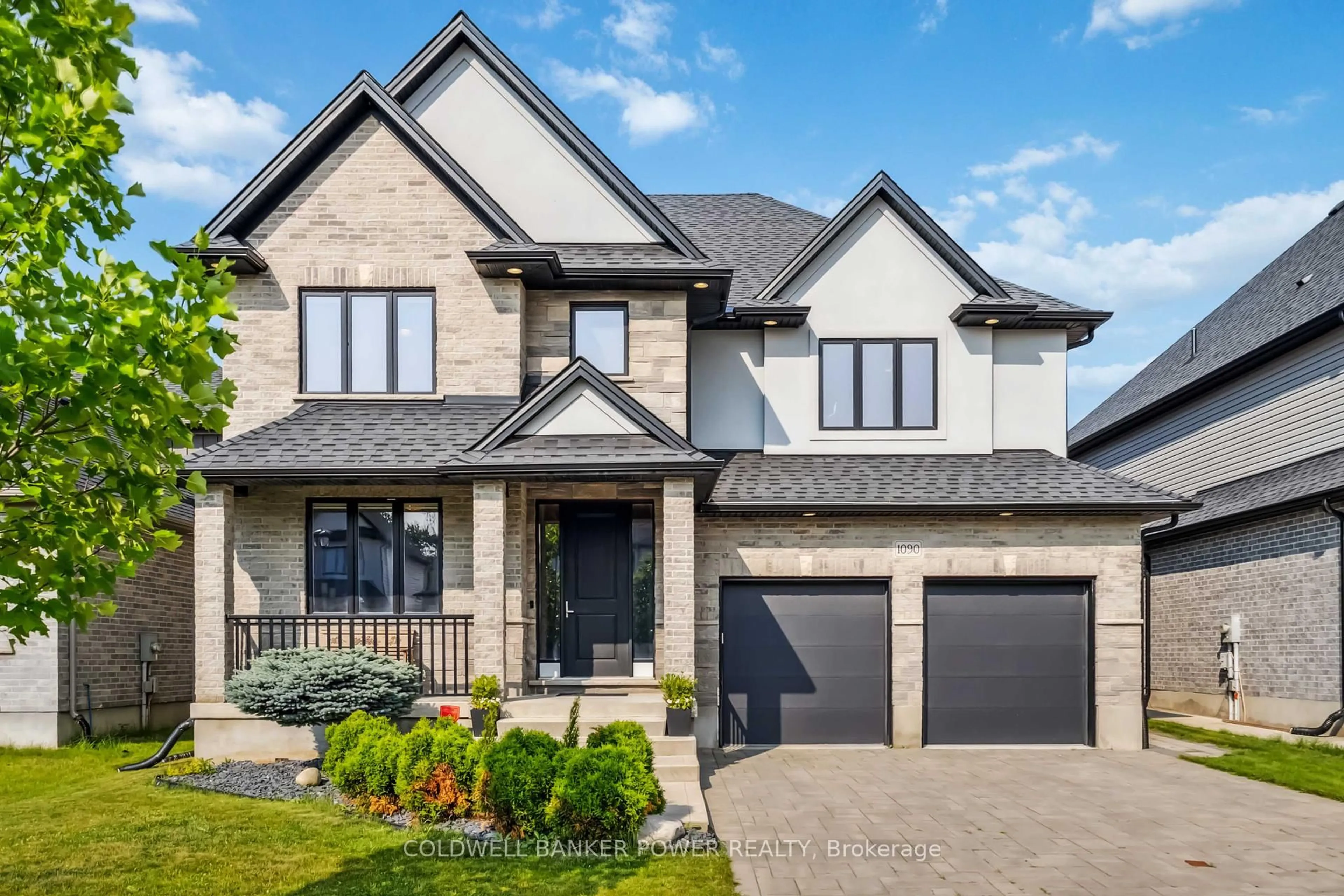 Home with brick exterior material, street for 1090 Eagletrace Dr, London North Ontario N6G 0S4