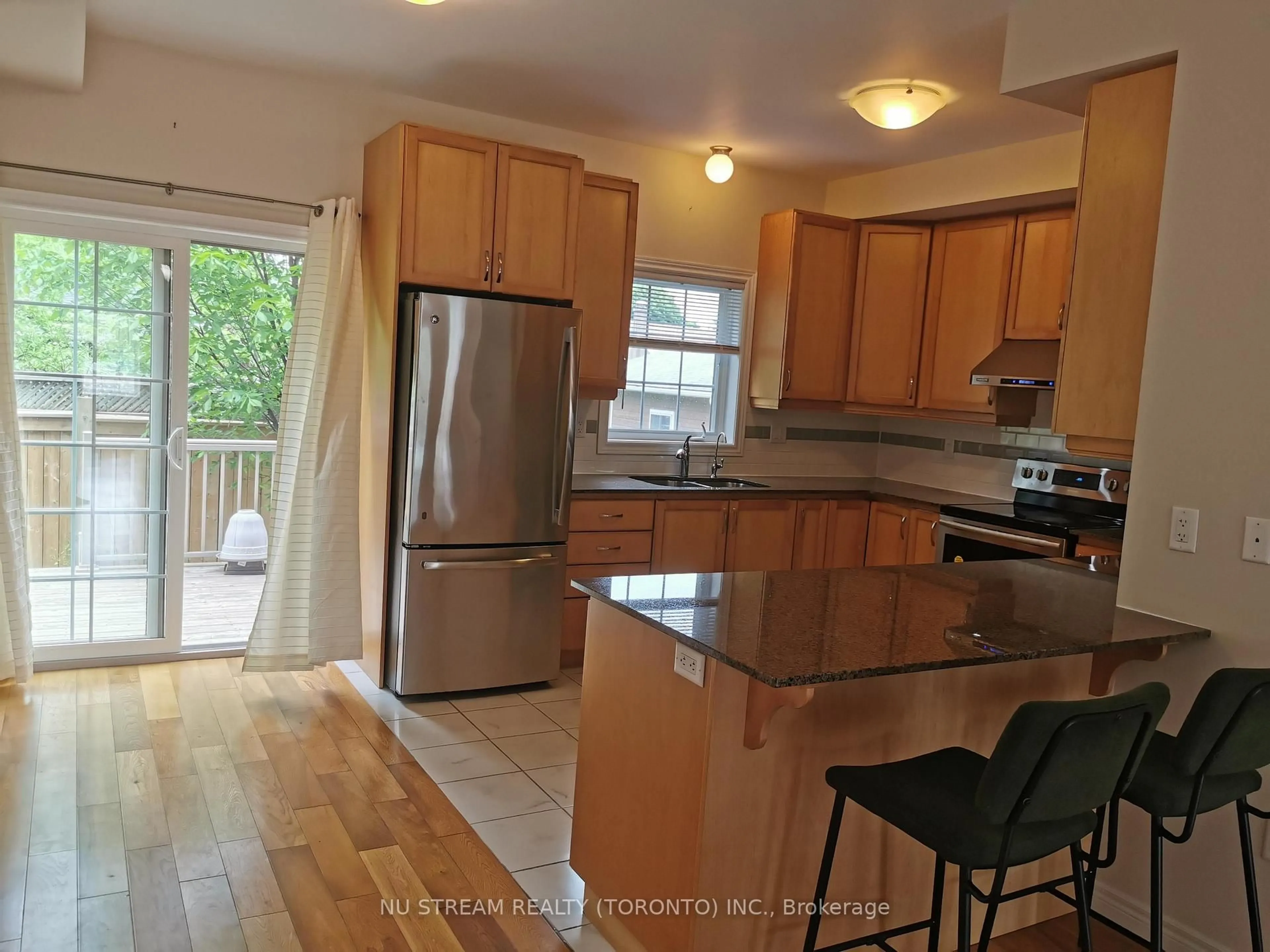 Open concept kitchen, wood/laminate floor for 84 Robert Peel Rd, Kitchener Ontario N2H 0B6