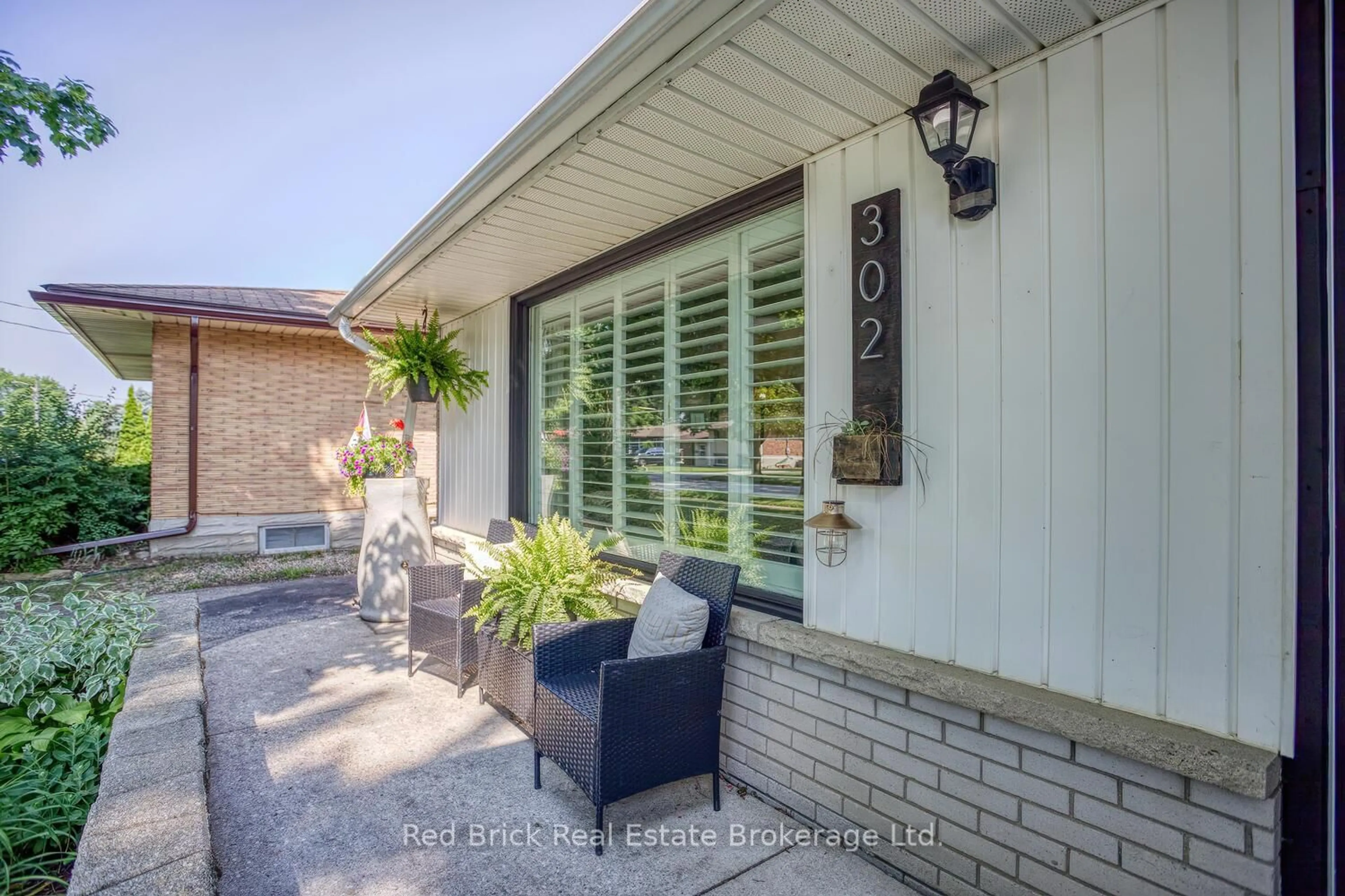 Home with brick exterior material, street for 302 Ross Ave, Kitchener Ontario N2A 1V6