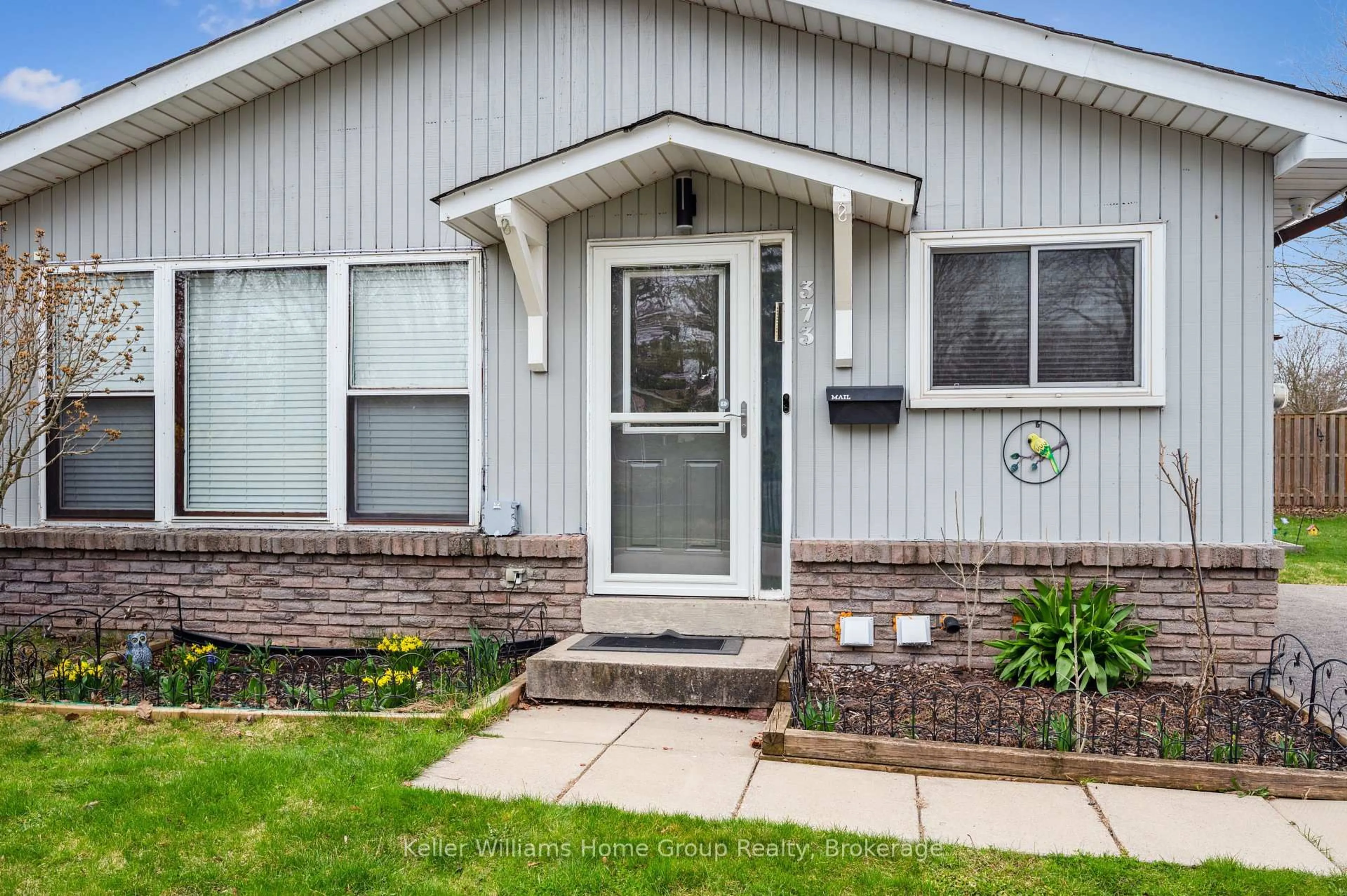 Home with vinyl exterior material, street for 373 West Acres Dr, Guelph Ontario N1H 7B3