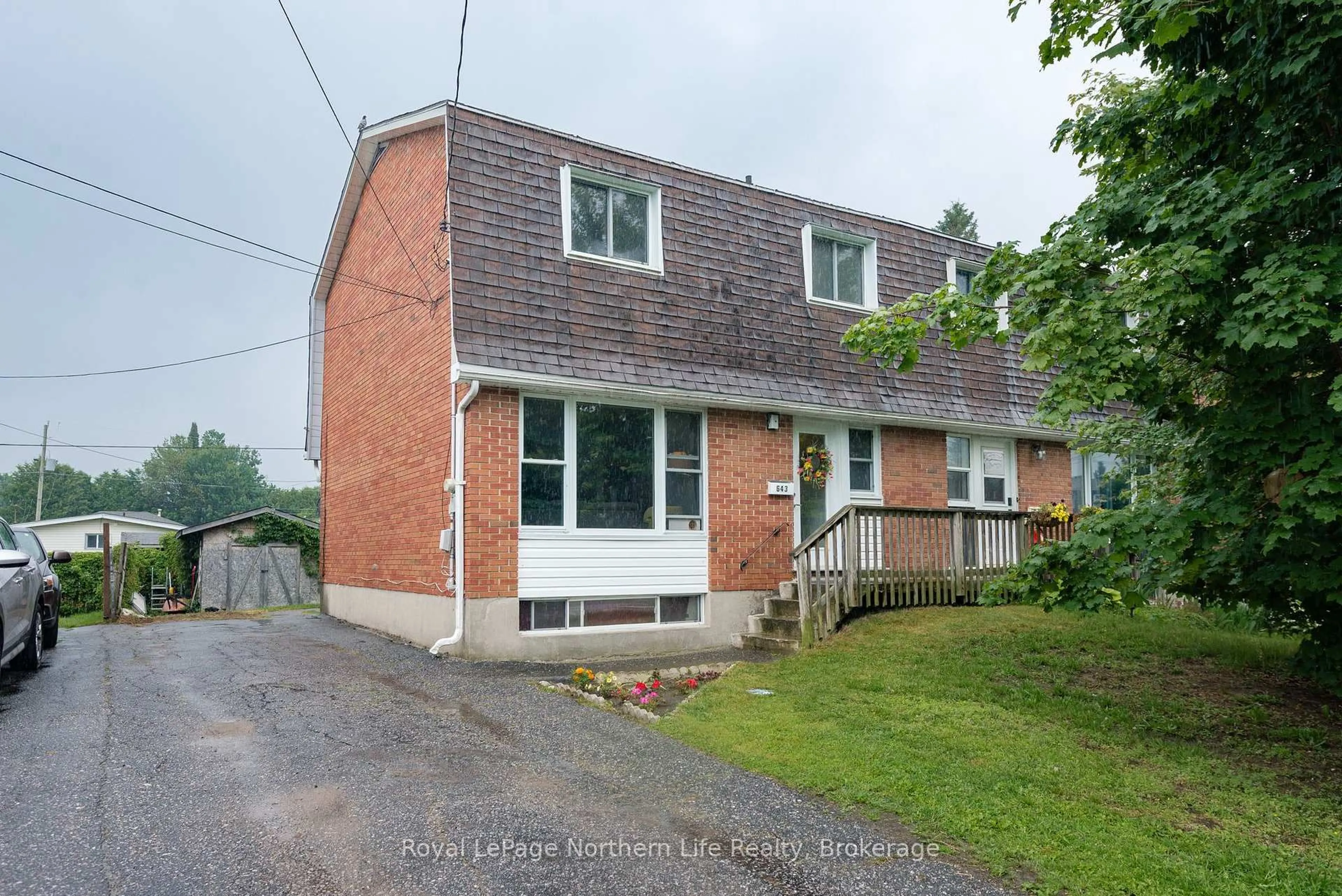 A pic from outside/outdoor area/front of a property/back of a property/a pic from drone, street for 643 Dane Ave, North Bay Ontario P1B 7G8