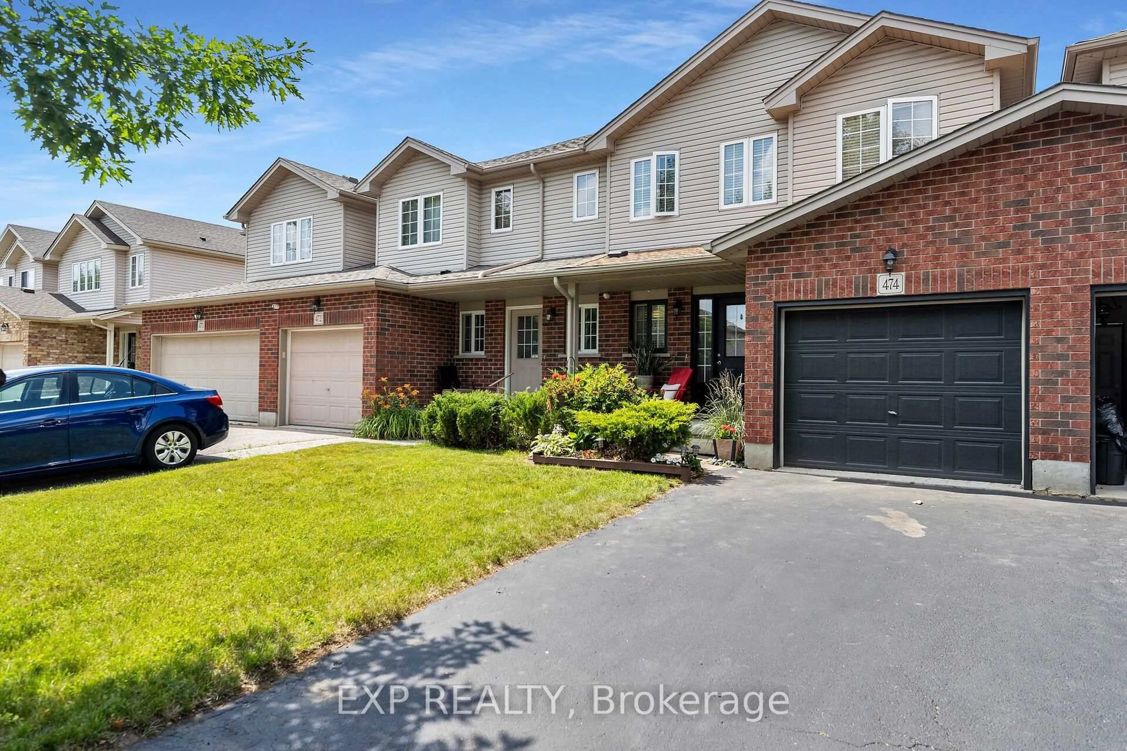 A pic from outside/outdoor area/front of a property/back of a property/a pic from drone, street for 474 Colt St, Waterloo Ontario N2K 4N8