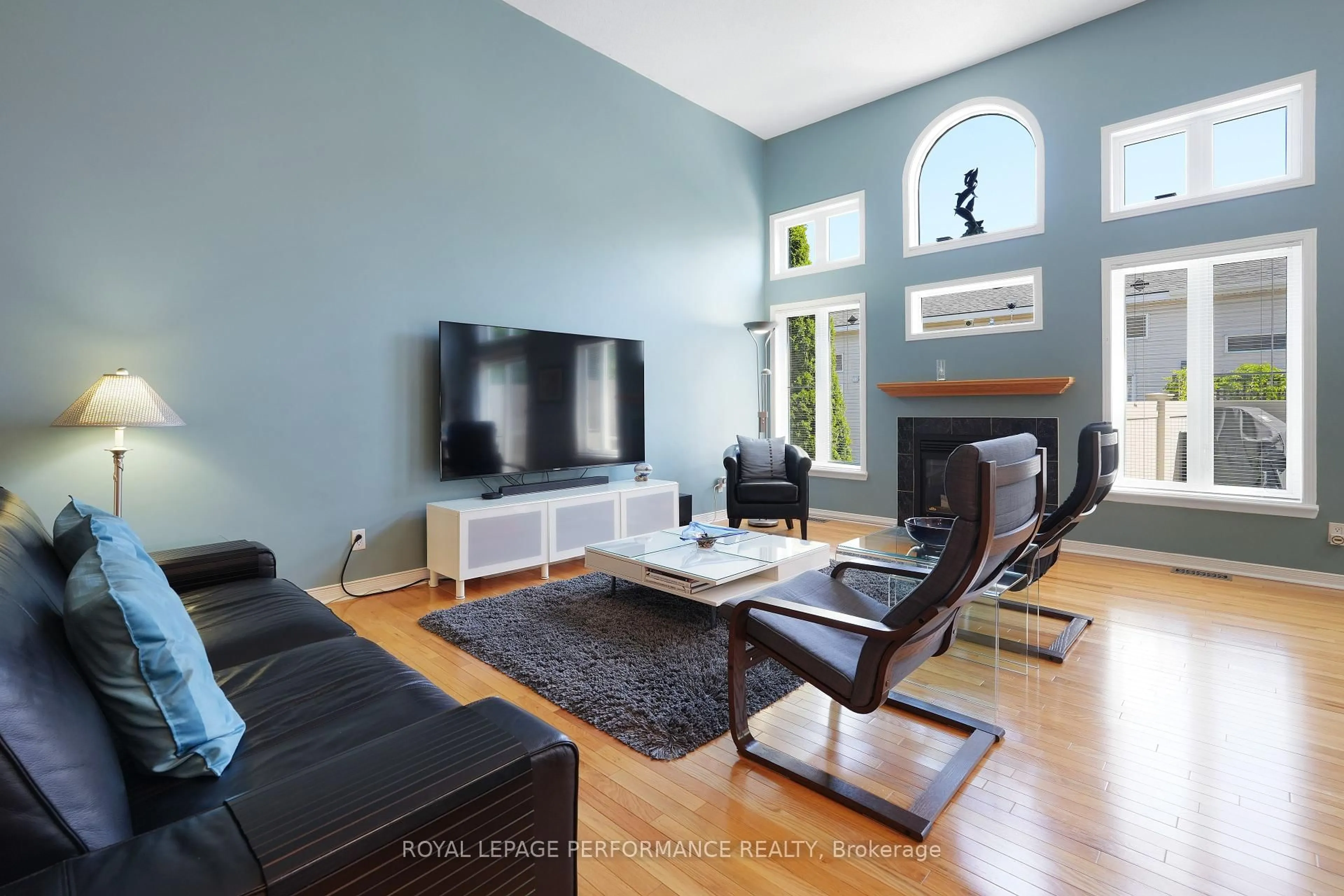 Living room with furniture, wood/laminate floor for 9 Maple Park Private, Ottawa Ontario K1T 4A6