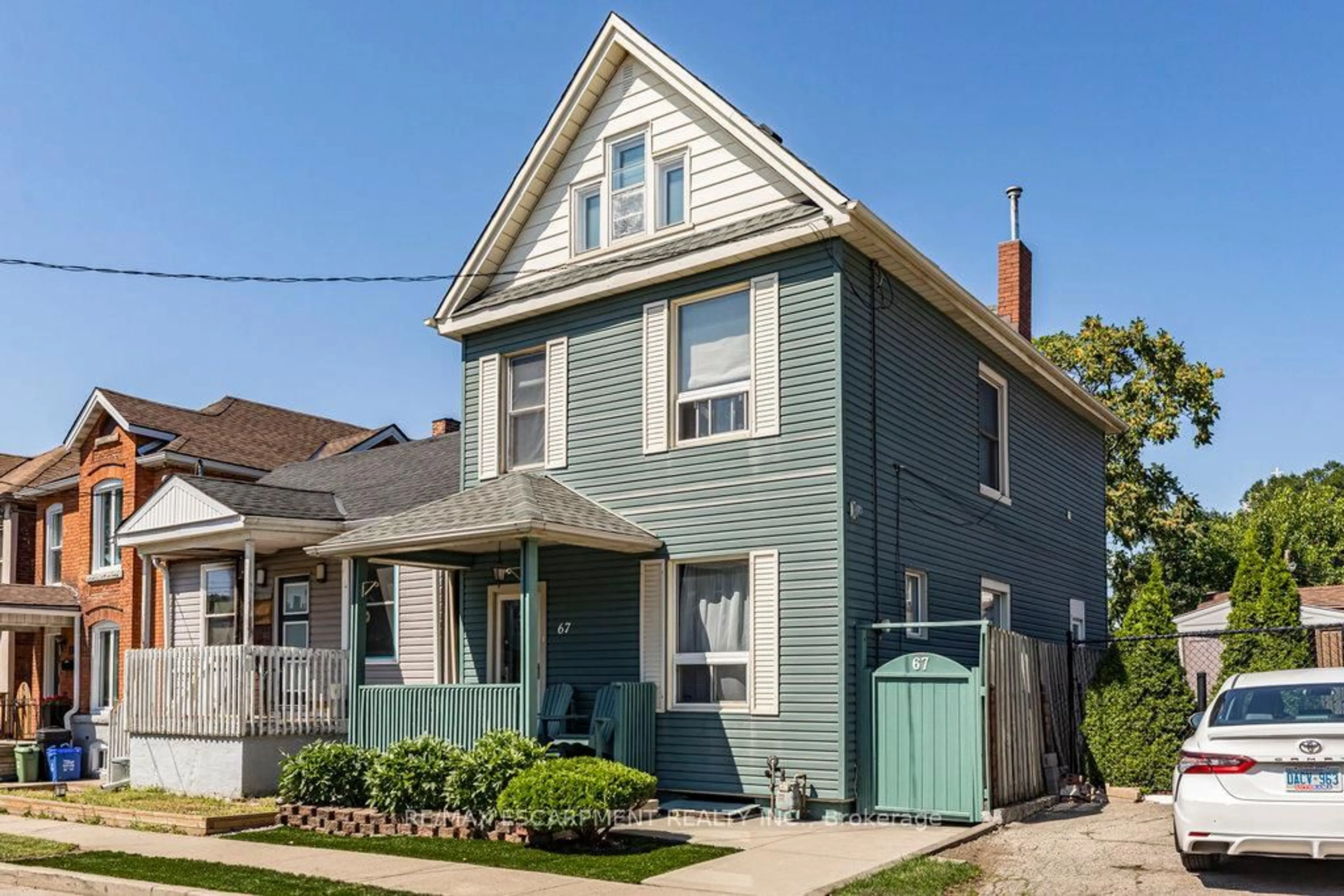 Home with vinyl exterior material, street for 67 Beechwood Ave, Hamilton Ontario L8L 2S5