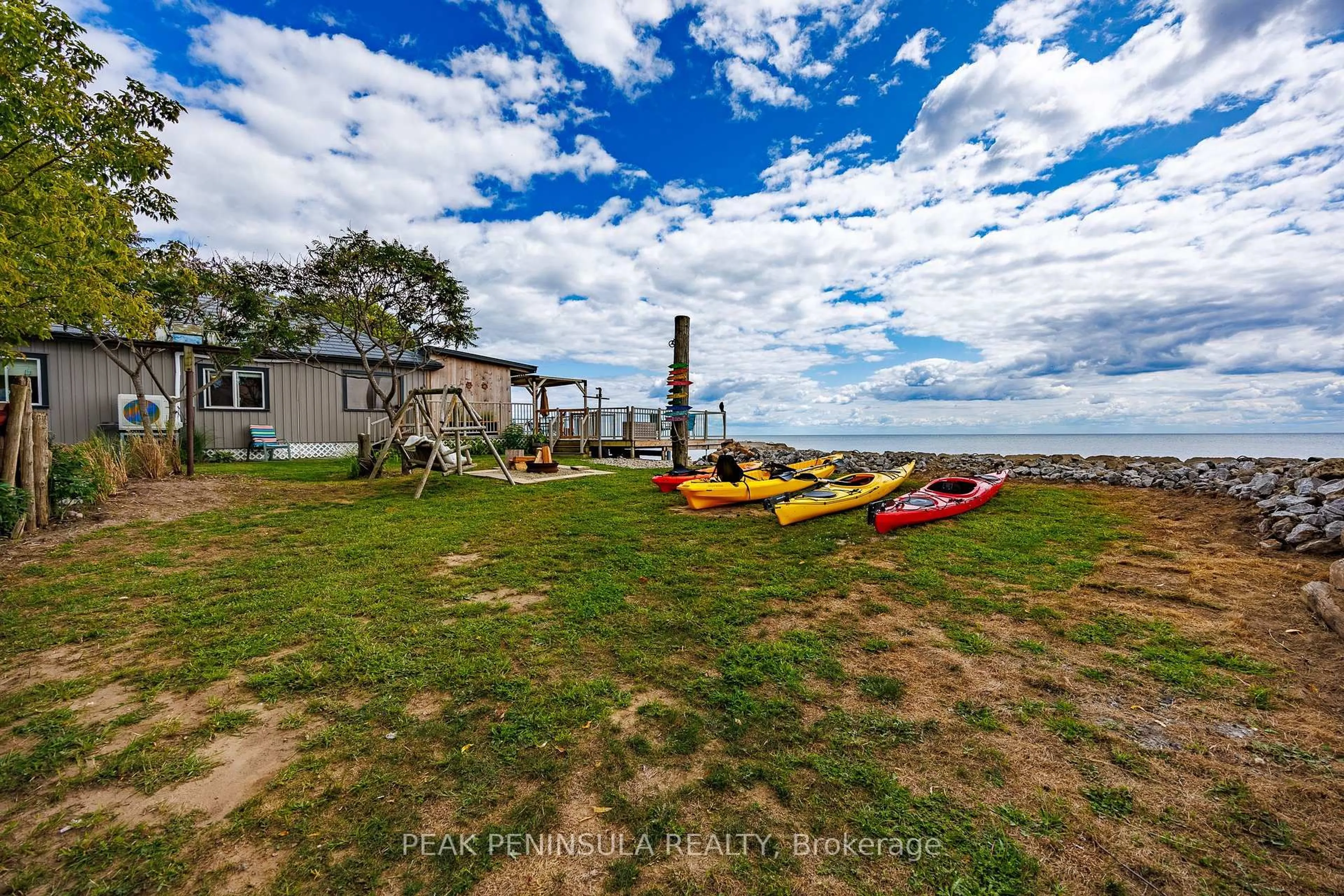 A pic from outside/outdoor area/front of a property/back of a property/a pic from drone, water/lake/river/ocean view for 221/223 Hastings Dr, Norfolk Ontario N0E 1M0