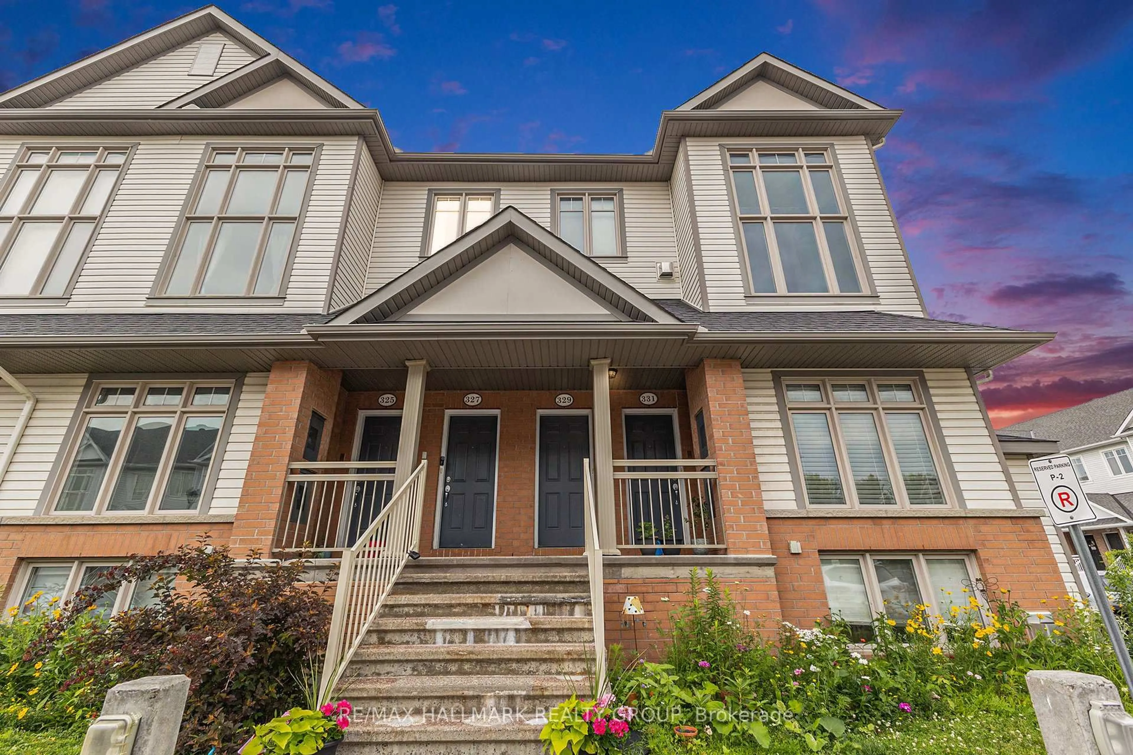 Home with brick exterior material, street for 327 Galston Private, Ottawa Ontario K1W 0G3