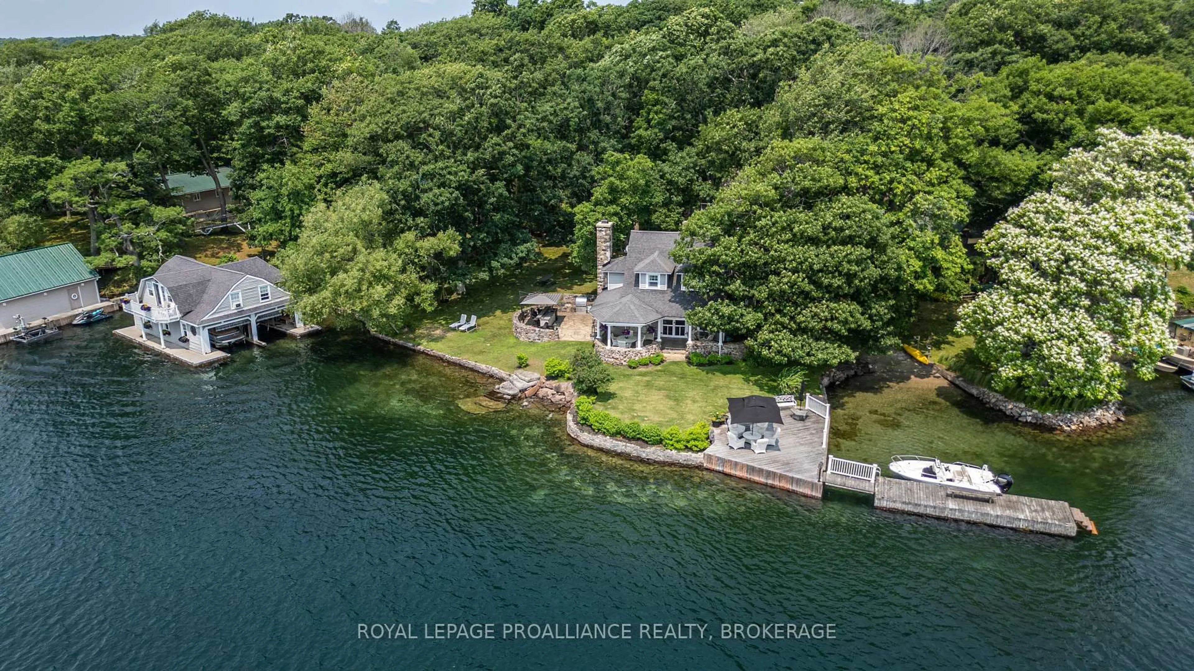 A pic from outside/outdoor area/front of a property/back of a property/a pic from drone, water/lake/river/ocean view for 121 Tremont Park Island, Leeds and the Thousand Islands Ontario K7G 3C9