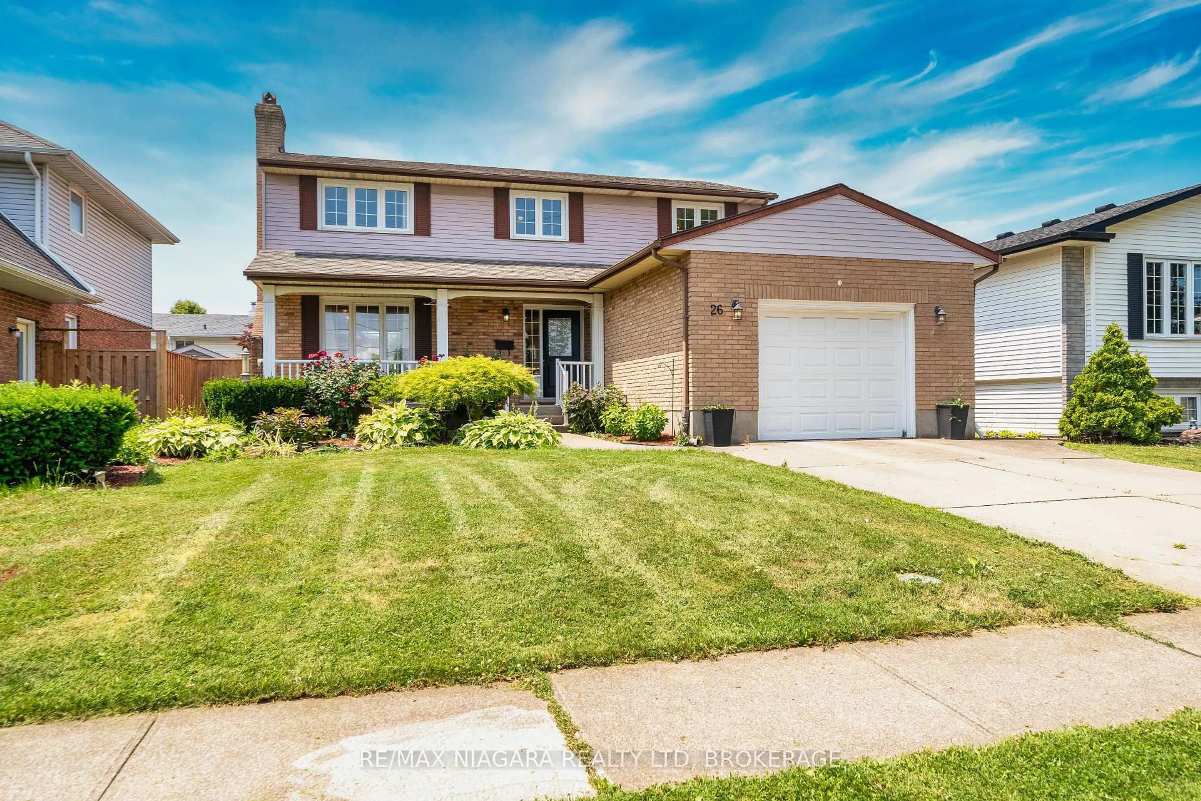 Home with vinyl exterior material, street for 26 CRESTCOMBE Rd, St. Catharines Ontario L2S 2J4