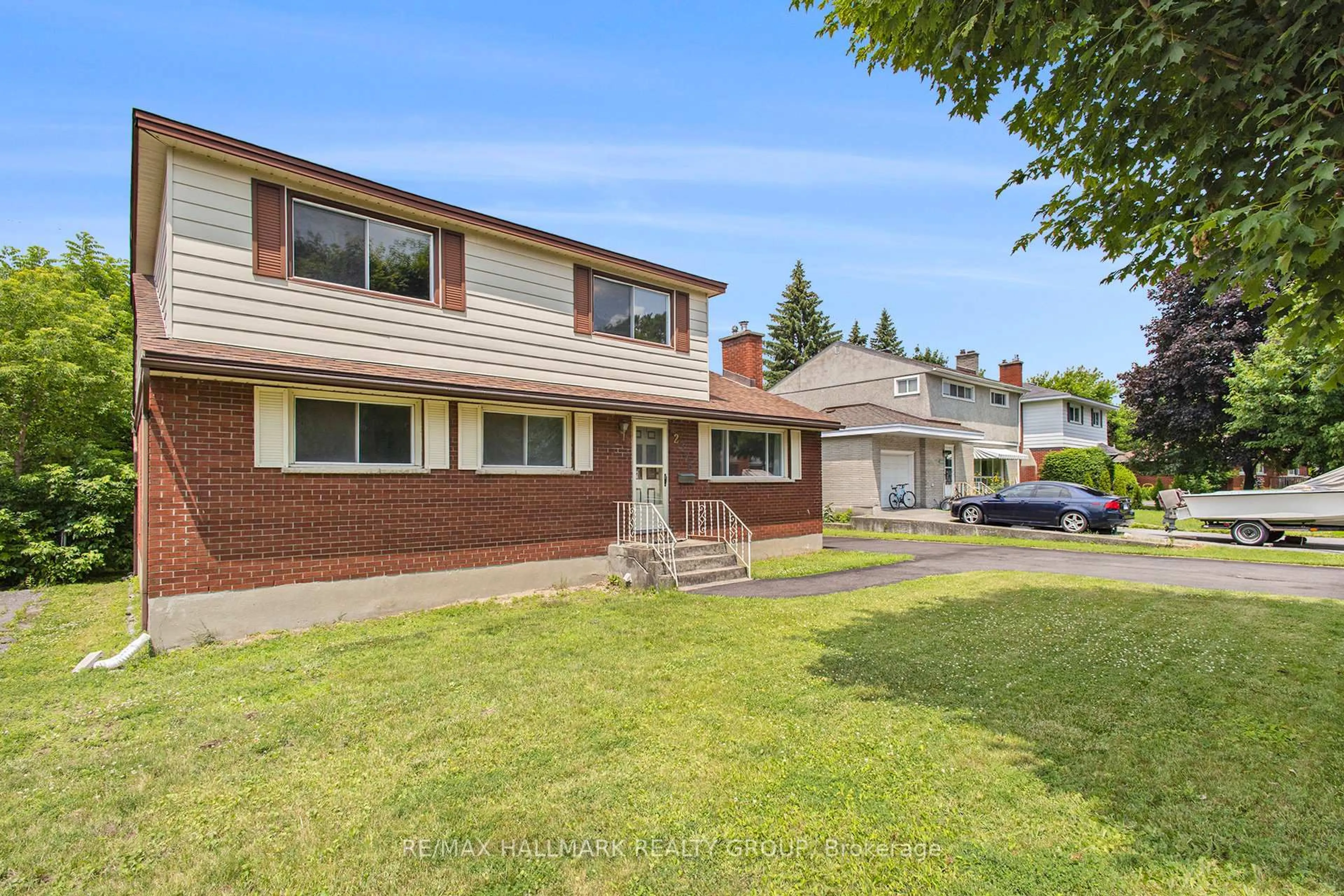 Home with brick exterior material, street for 2375 Cheshire Rd, Ottawa Ontario K2C 1G2