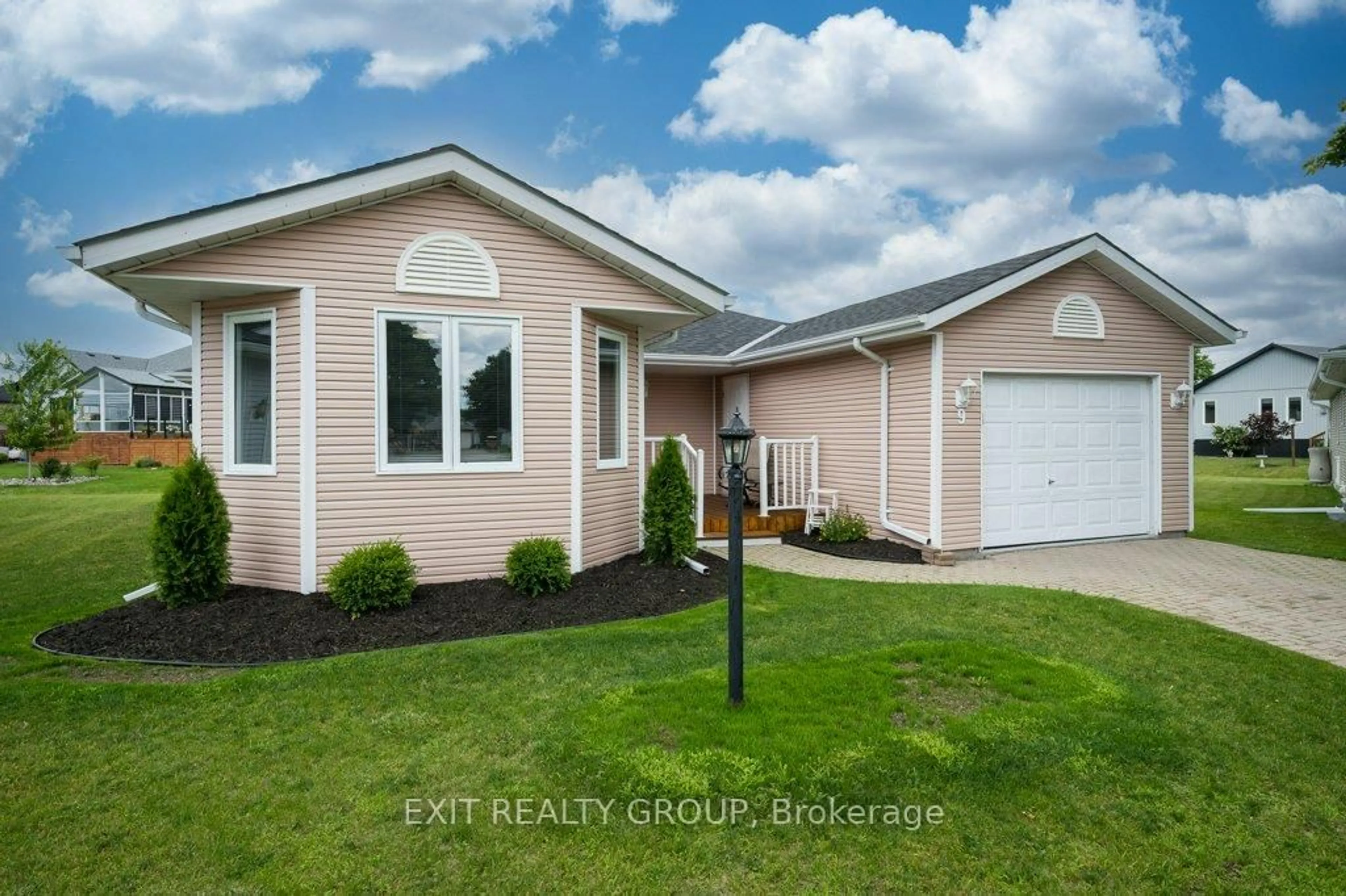 Home with vinyl exterior material, street for 9 Quaker Crt, Prince Edward County Ontario K0K 3L0
