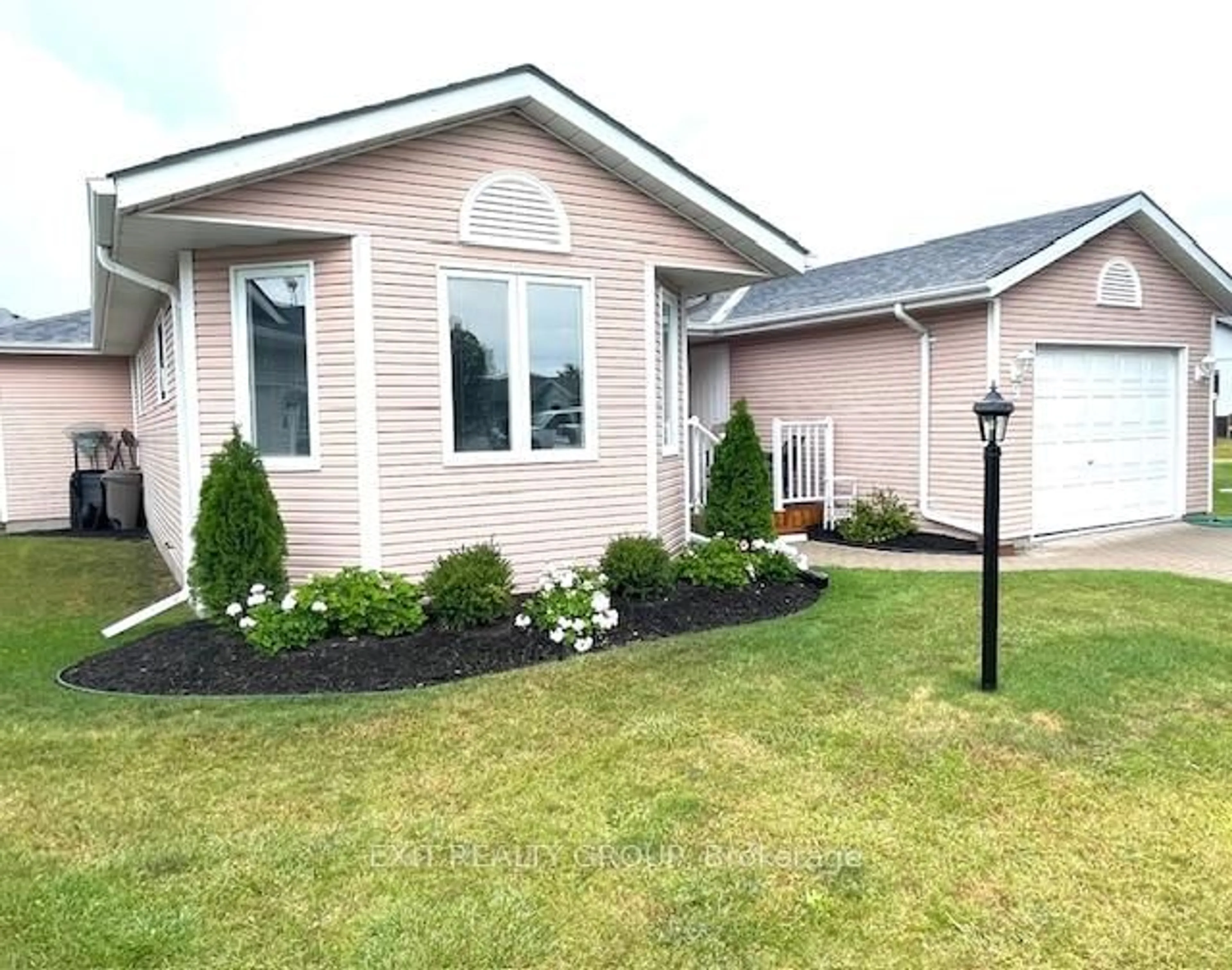 Home with vinyl exterior material, street for 9 Quaker Crt, Prince Edward County Ontario K0K 3L0