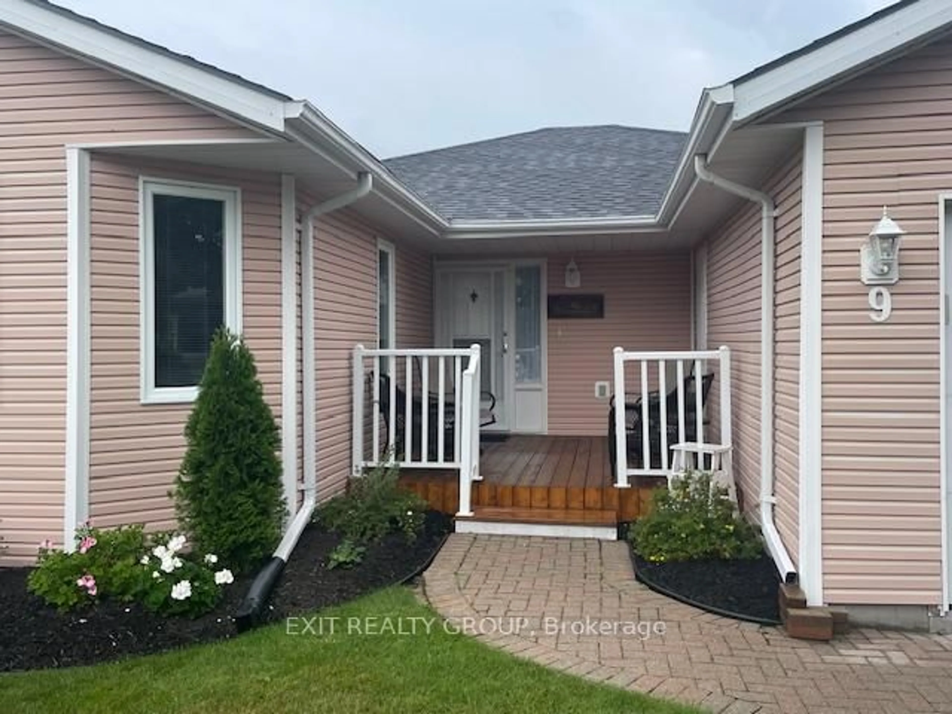 Home with vinyl exterior material, street for 9 Quaker Crt, Prince Edward County Ontario K0K 3L0