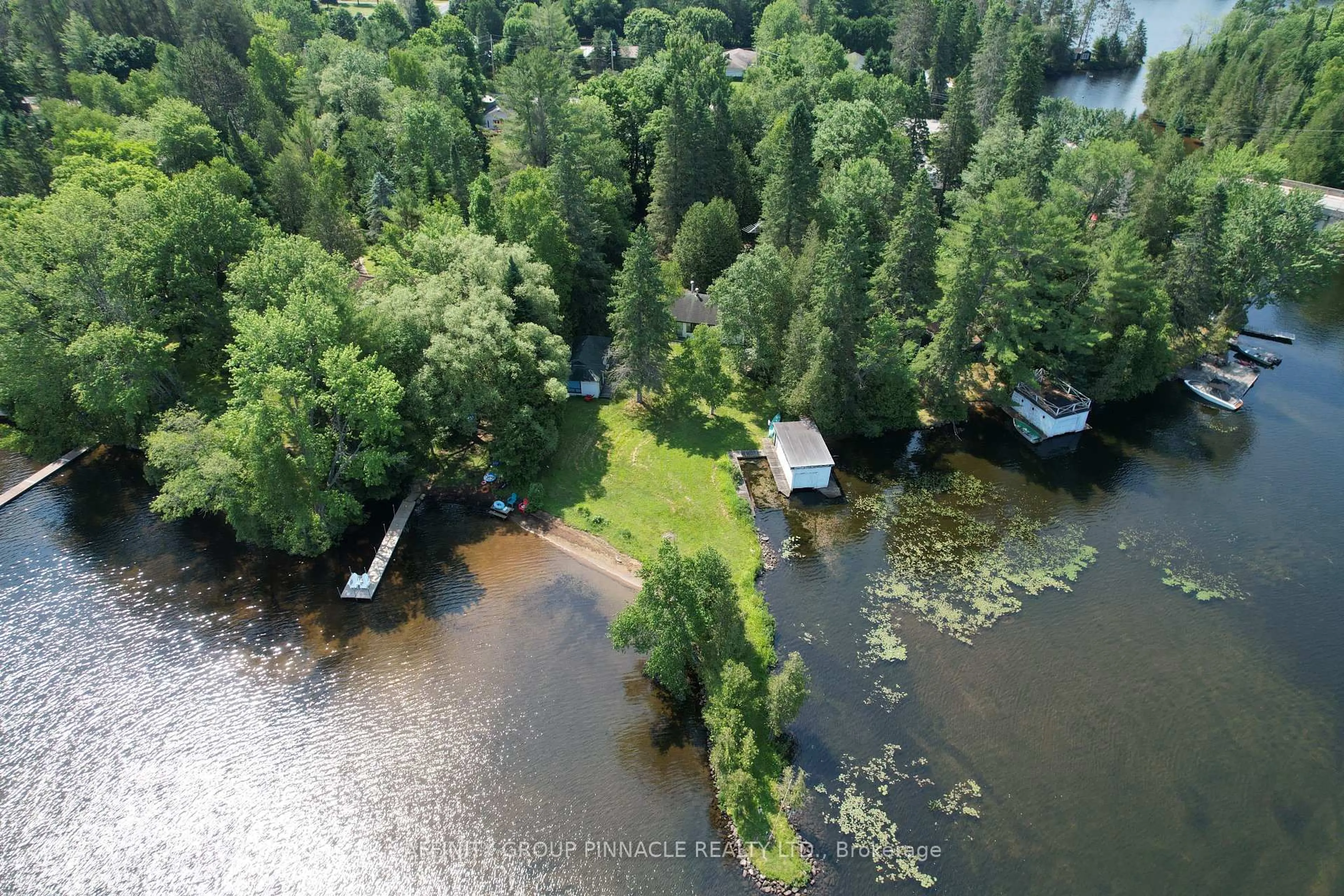 A pic from outside/outdoor area/front of a property/back of a property/a pic from drone, water/lake/river/ocean view for 1265 Kashagawigamog Lake Rd, Minden Hills Ontario K0M 2K0