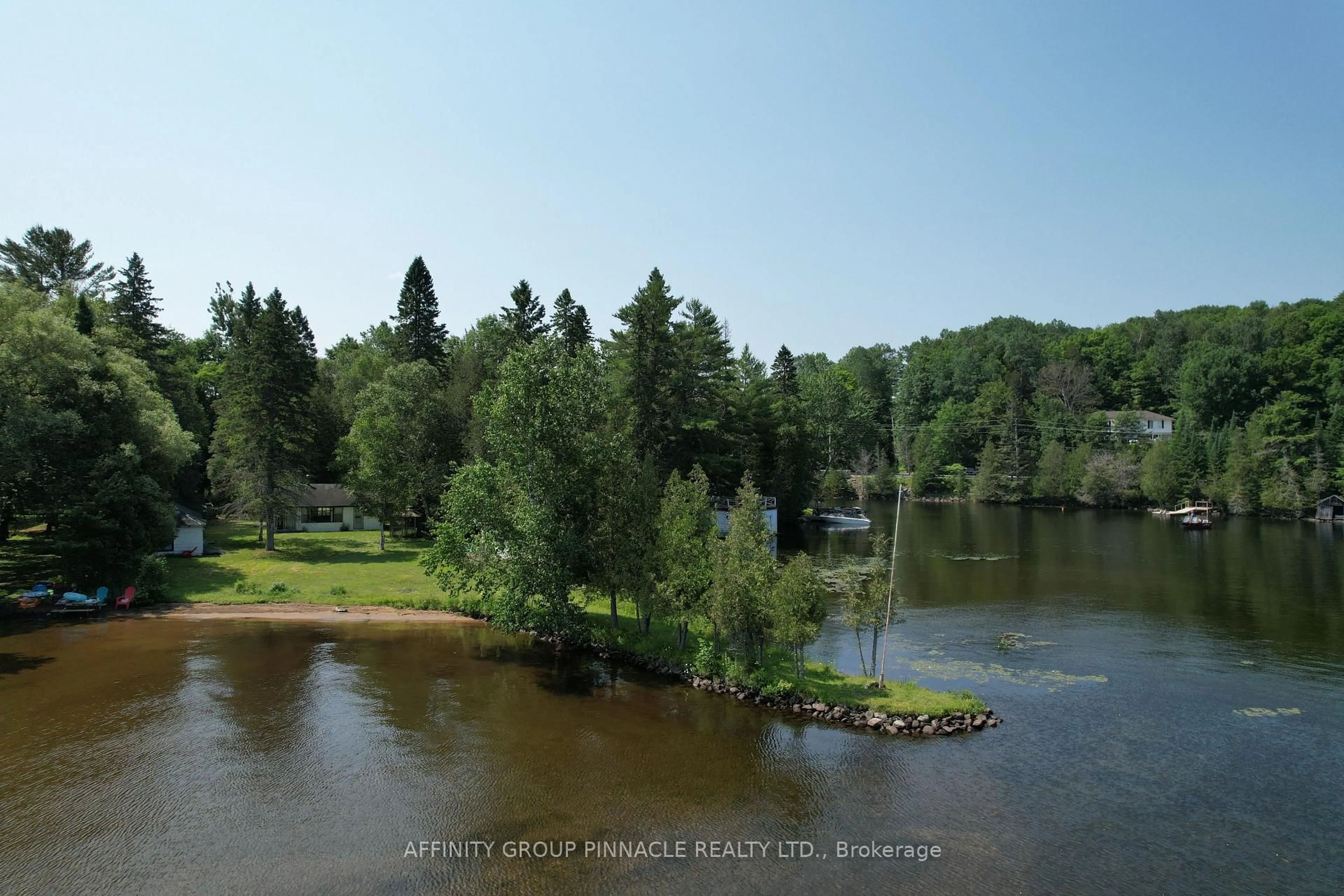 A pic from outside/outdoor area/front of a property/back of a property/a pic from drone, water/lake/river/ocean view for 1265 Kashagawigamog Lake Rd, Minden Hills Ontario K0M 2K0