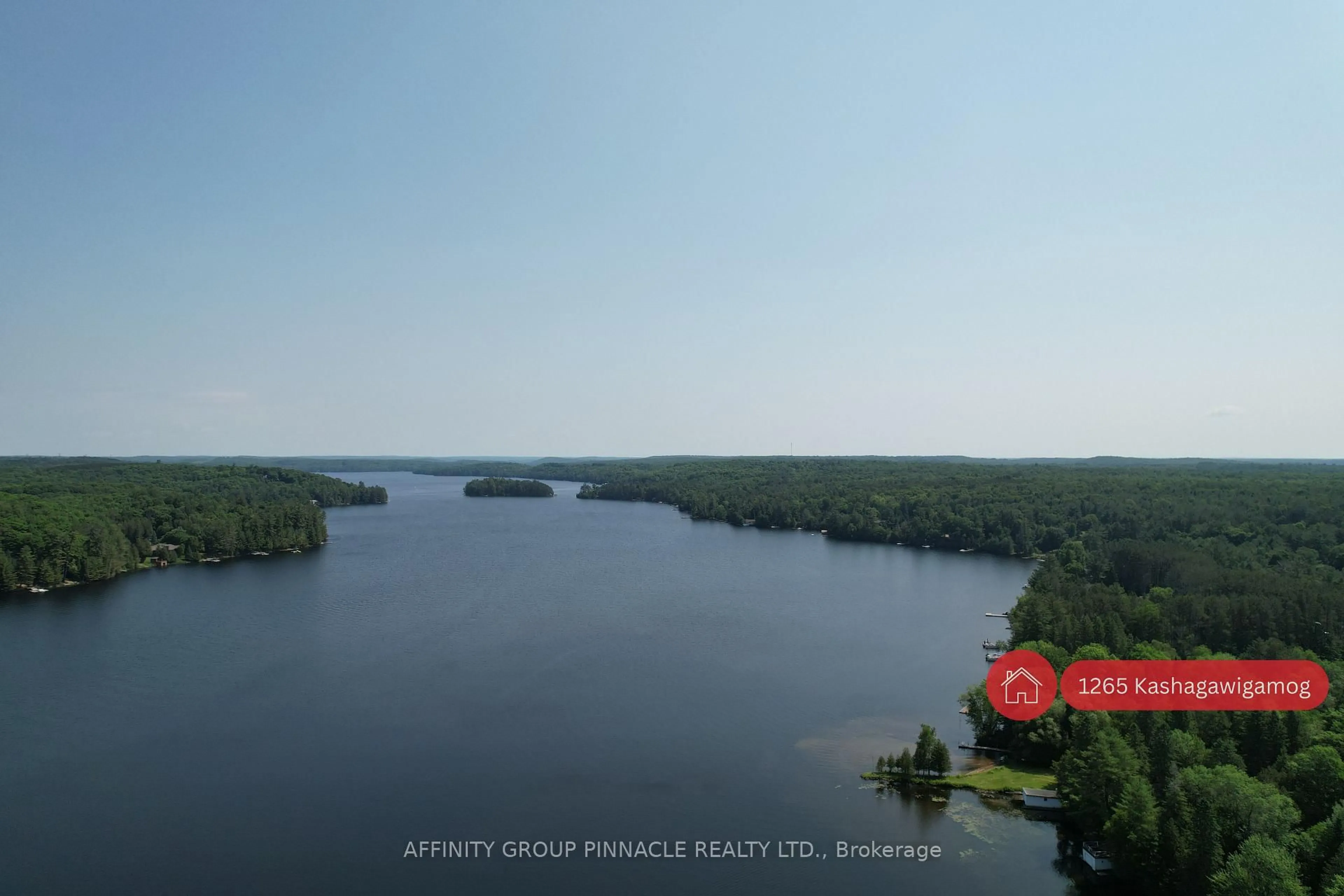 A pic from outside/outdoor area/front of a property/back of a property/a pic from drone, water/lake/river/ocean view for 1265 Kashagawigamog Lake Rd, Minden Hills Ontario K0M 2K0