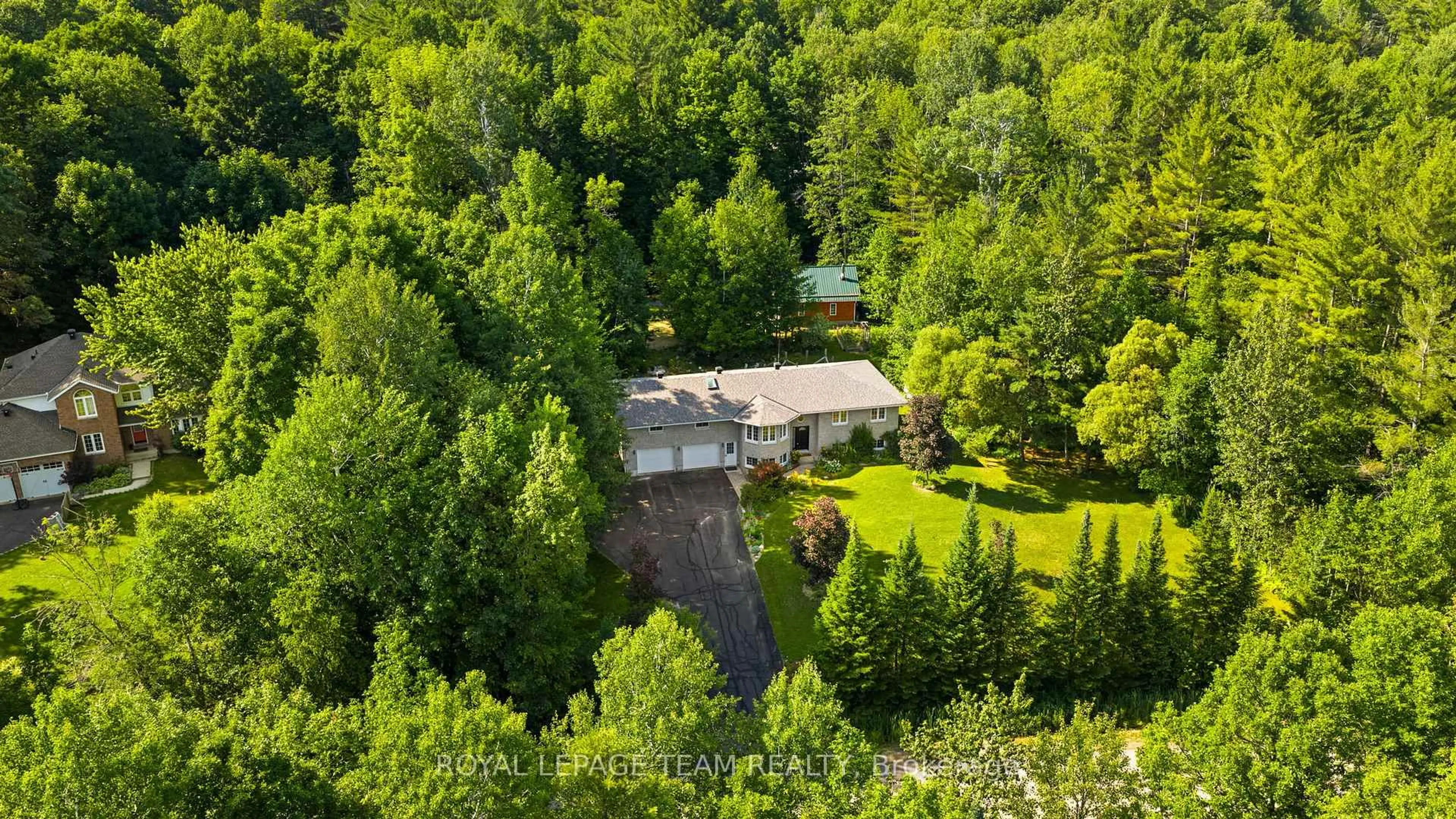 A pic from outside/outdoor area/front of a property/back of a property/a pic from drone, forest/trees view for 99 Krause St, Pembroke Ontario K8A 6W6