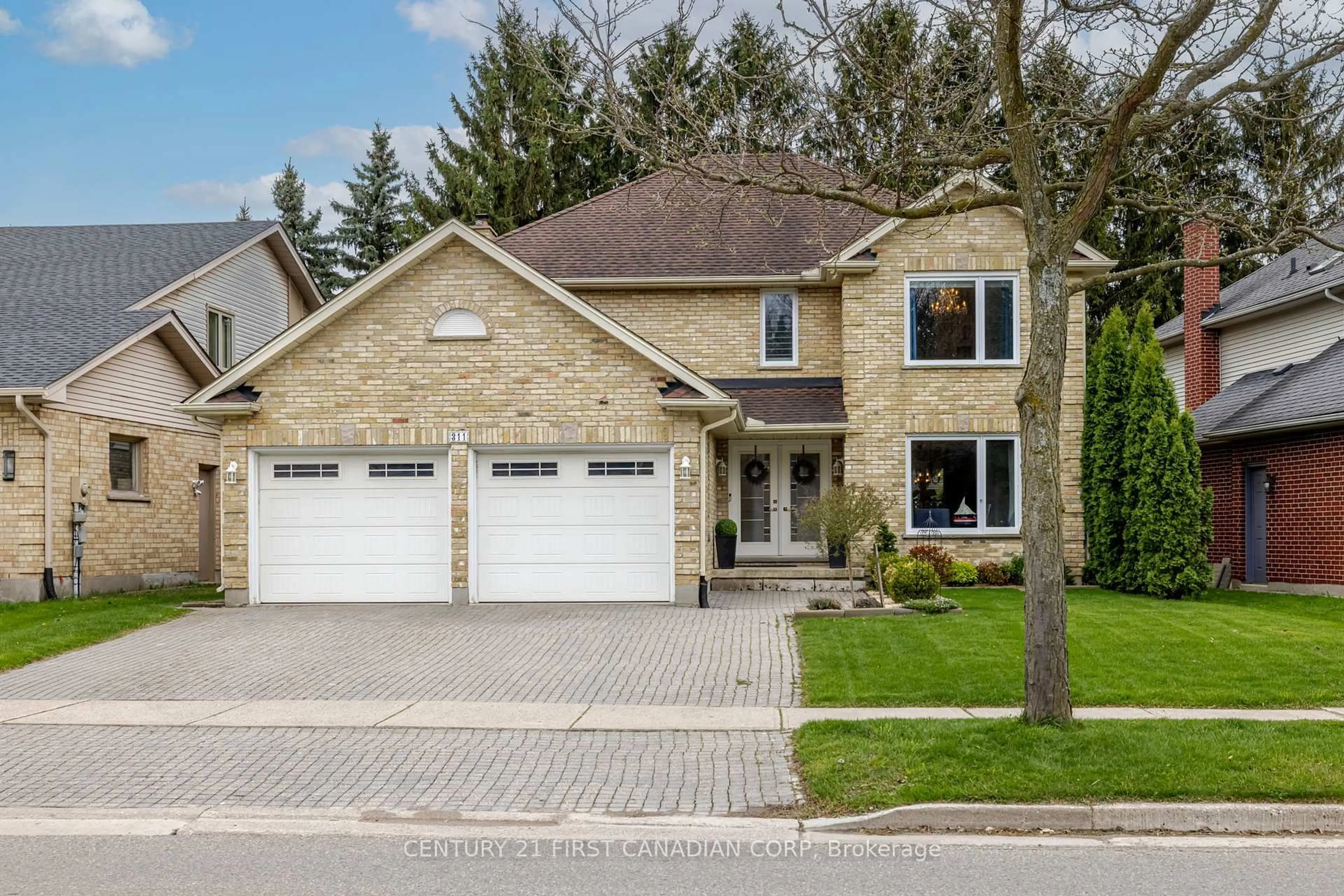 Home with brick exterior material, street for 311 Ambleside Dr, London North Ontario N6G 4V8
